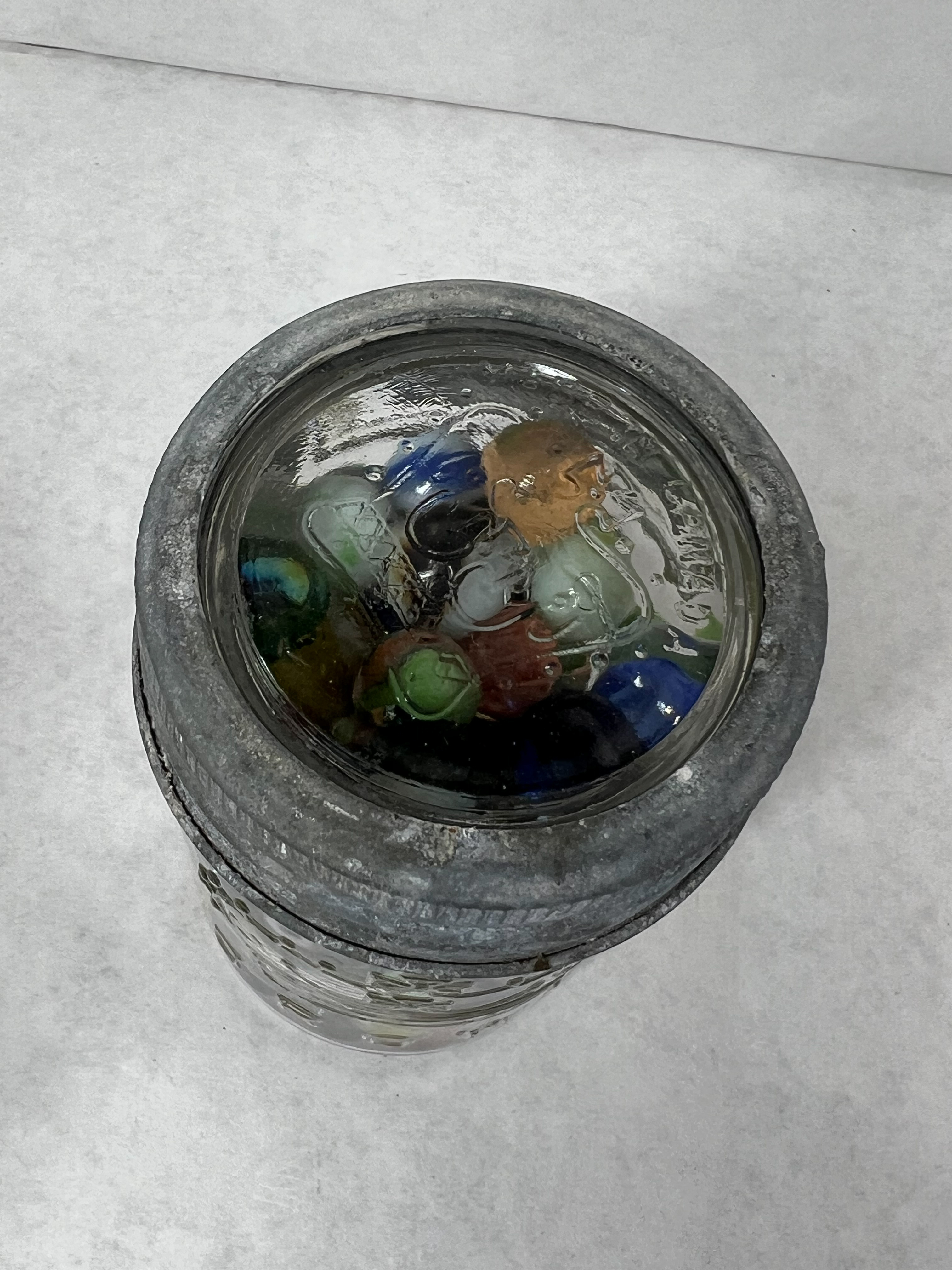 CROWN, MARBLES AND JAR, 20TH CENTURY