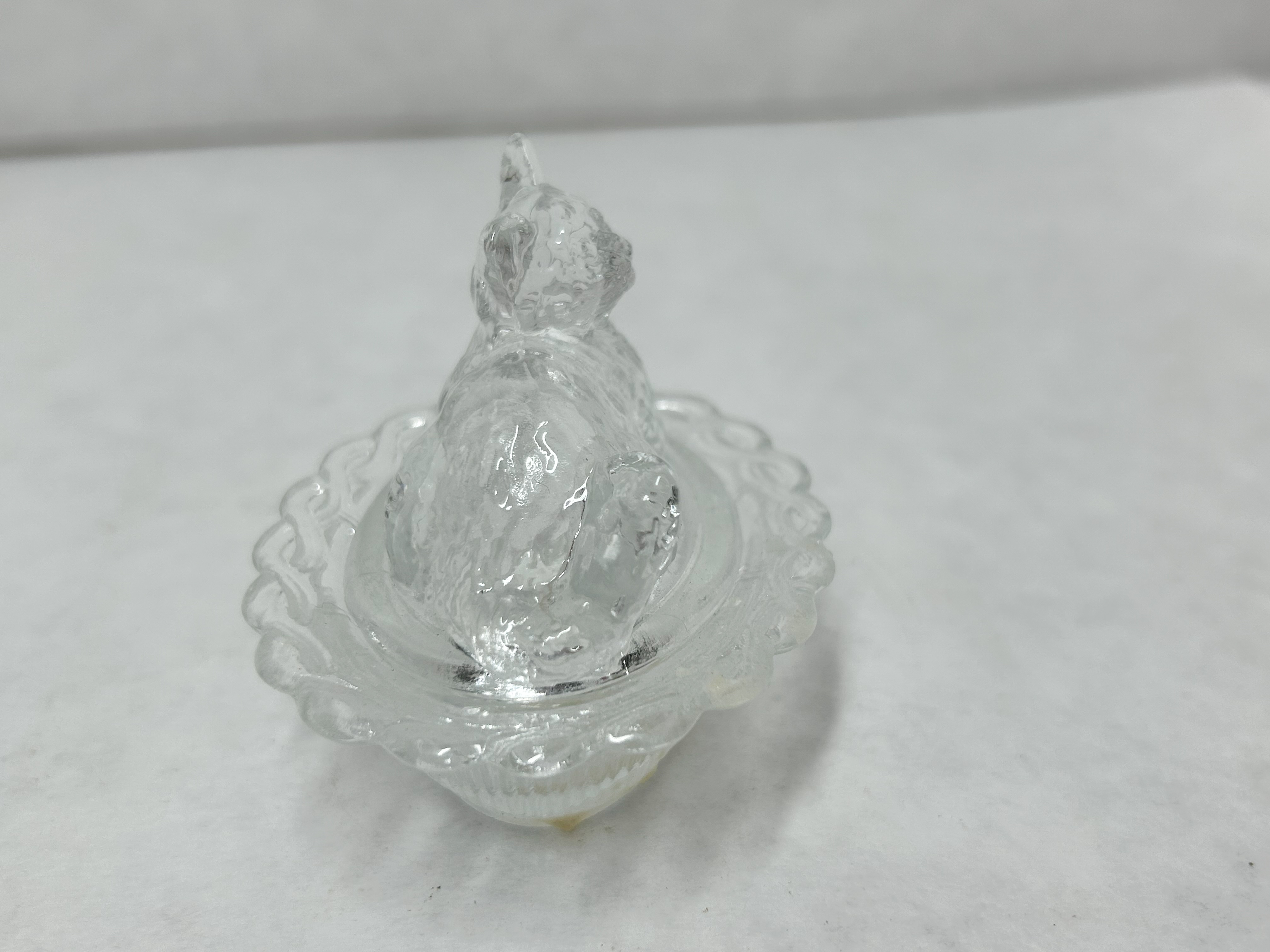 CLEAR PRESSED GLASS CAT ON NEST