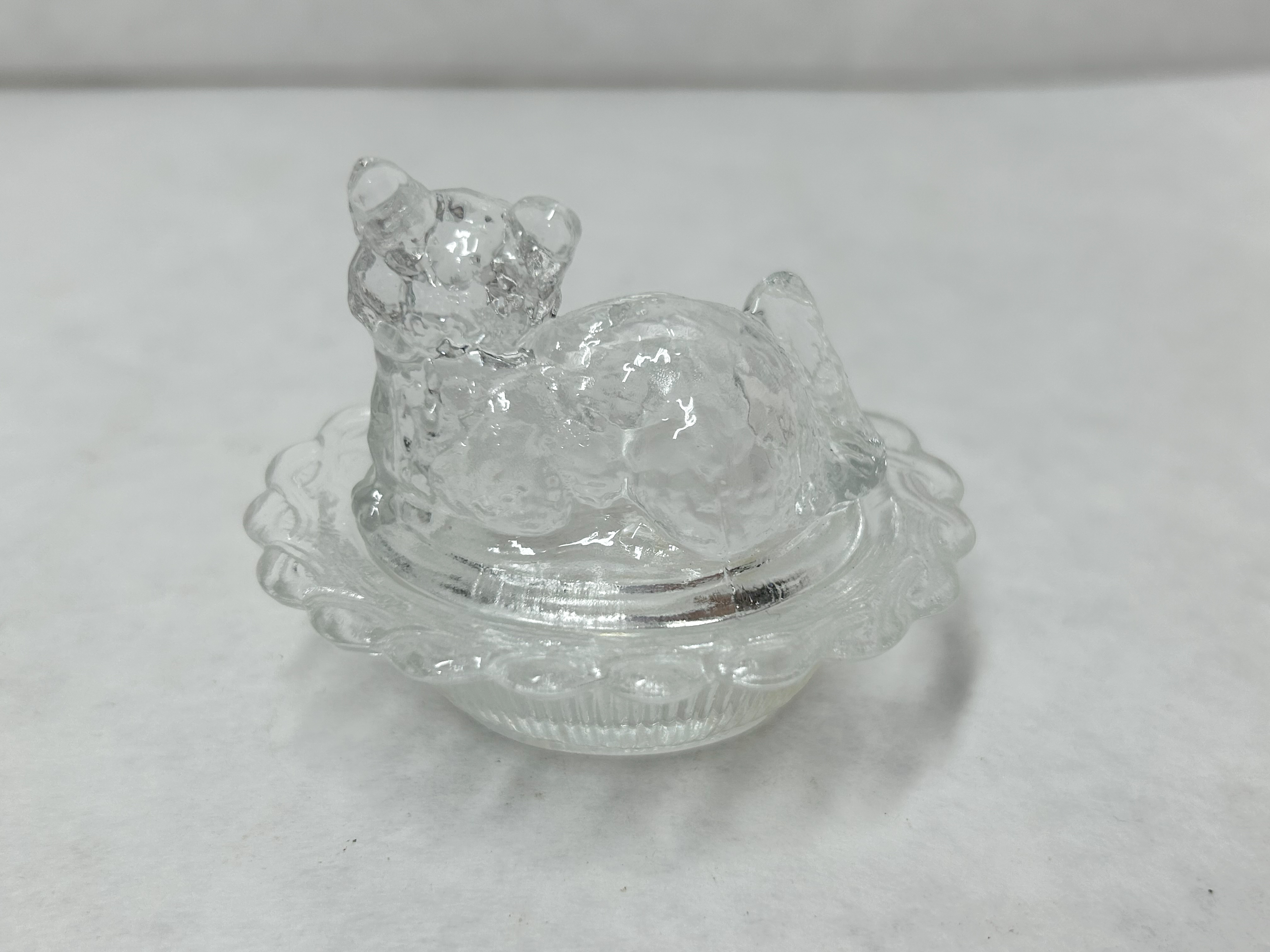 CLEAR PRESSED GLASS CAT ON NEST