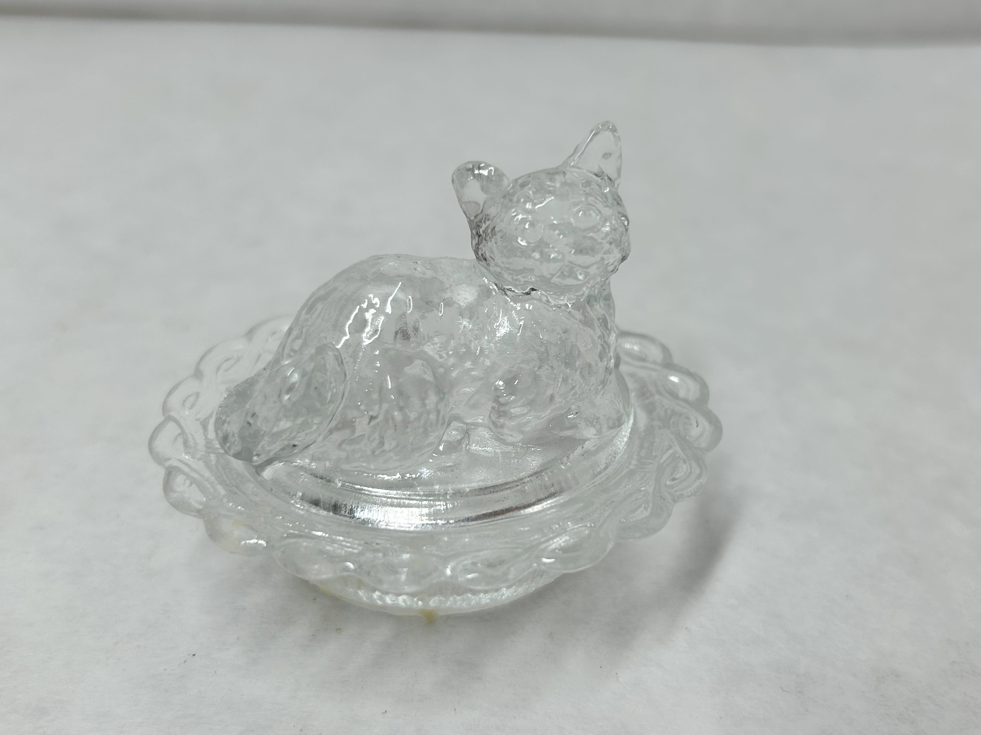 CLEAR PRESSED GLASS CAT ON NEST