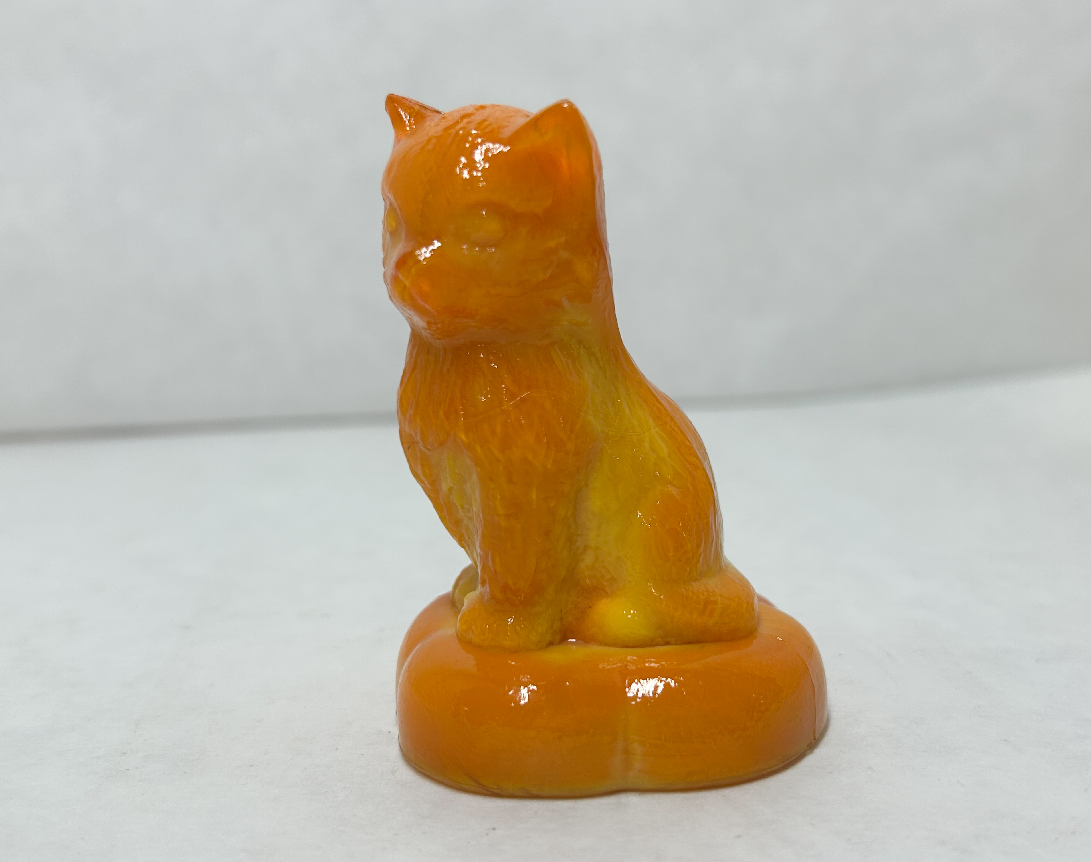 BOYD ORANGE SLAG KITTEN ON PILLOW