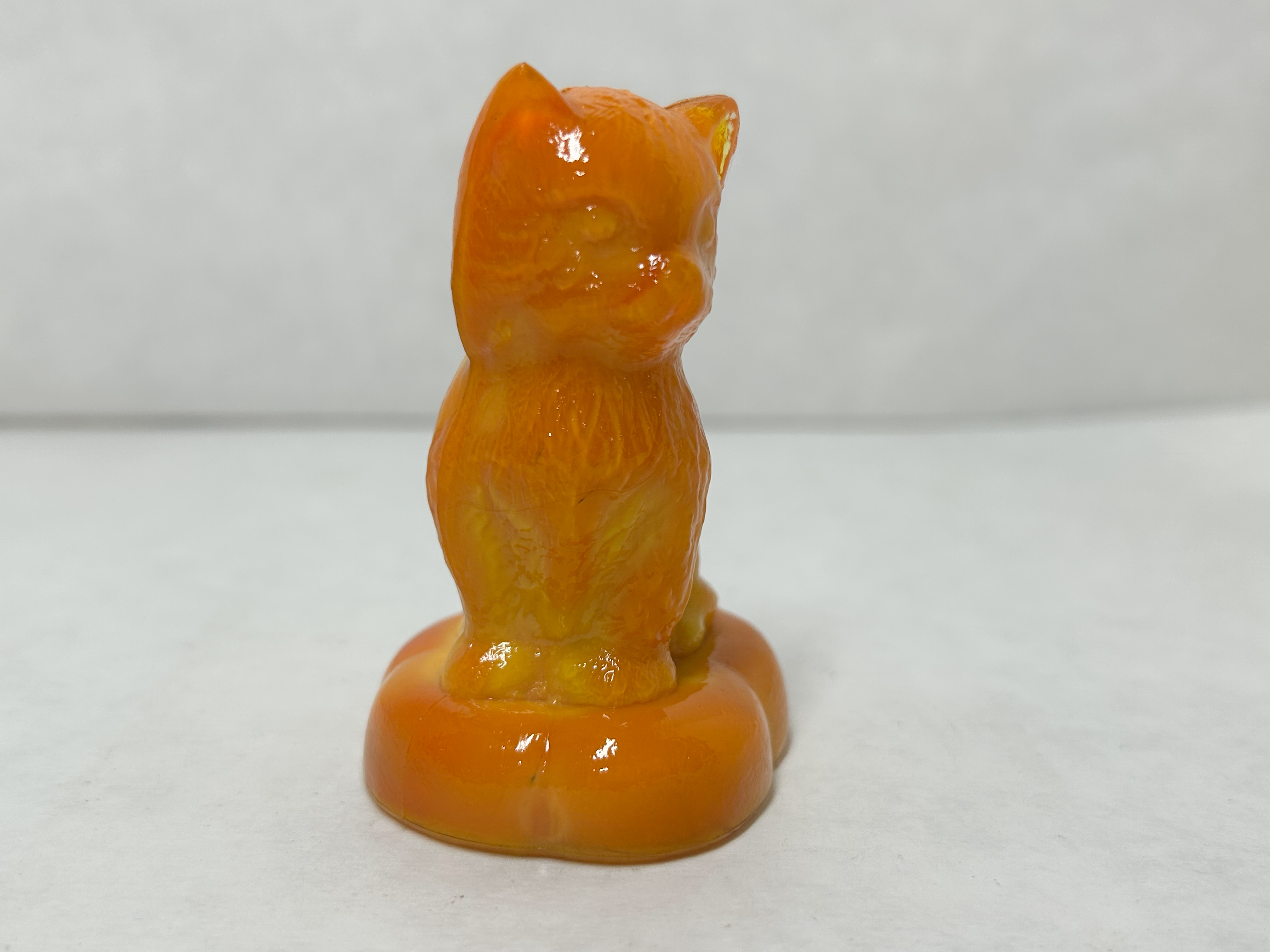 BOYD ORANGE SLAG KITTEN ON PILLOW