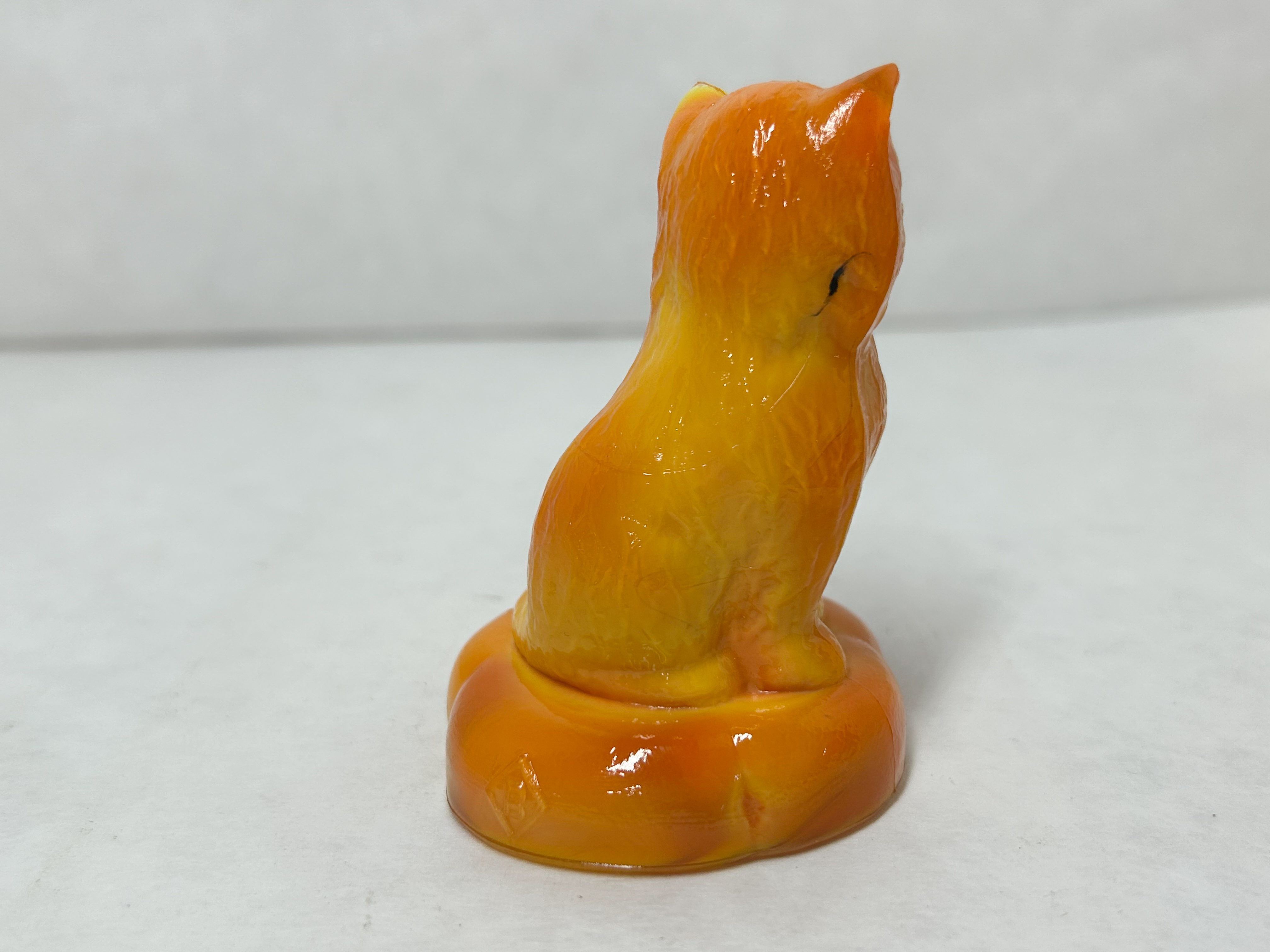 BOYD ORANGE SLAG KITTEN ON PILLOW