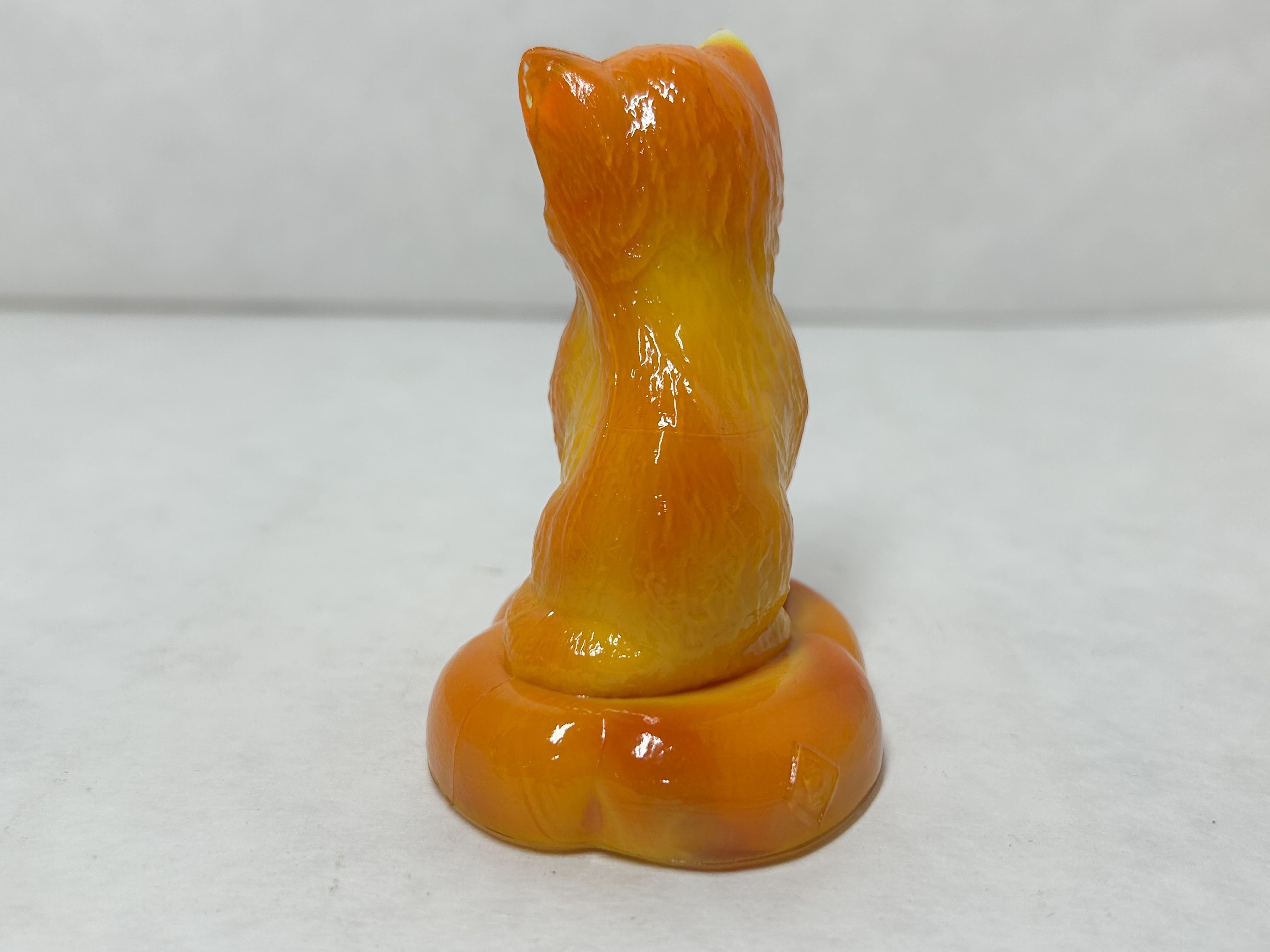 BOYD ORANGE SLAG KITTEN ON PILLOW