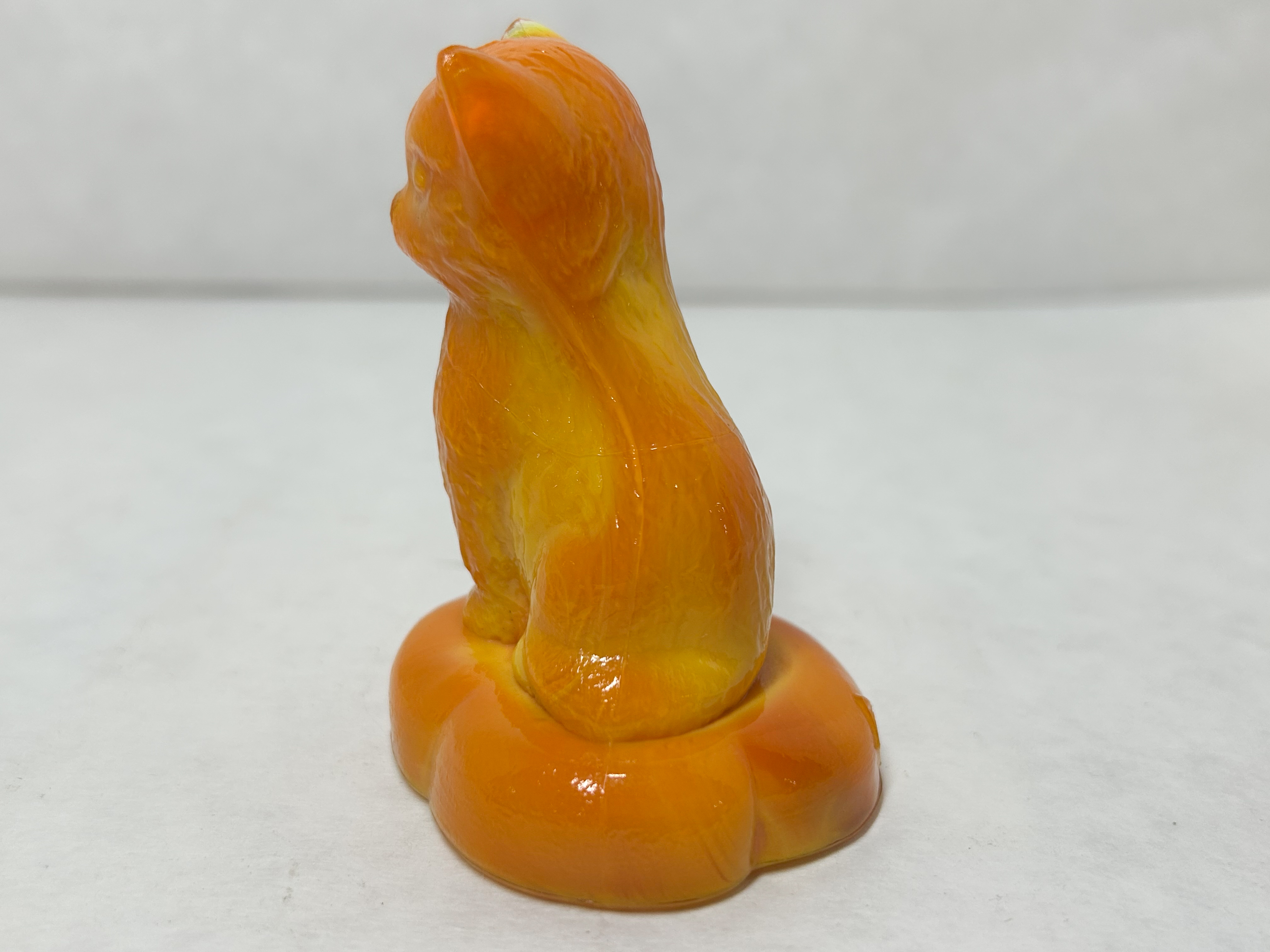 BOYD ORANGE SLAG KITTEN ON PILLOW