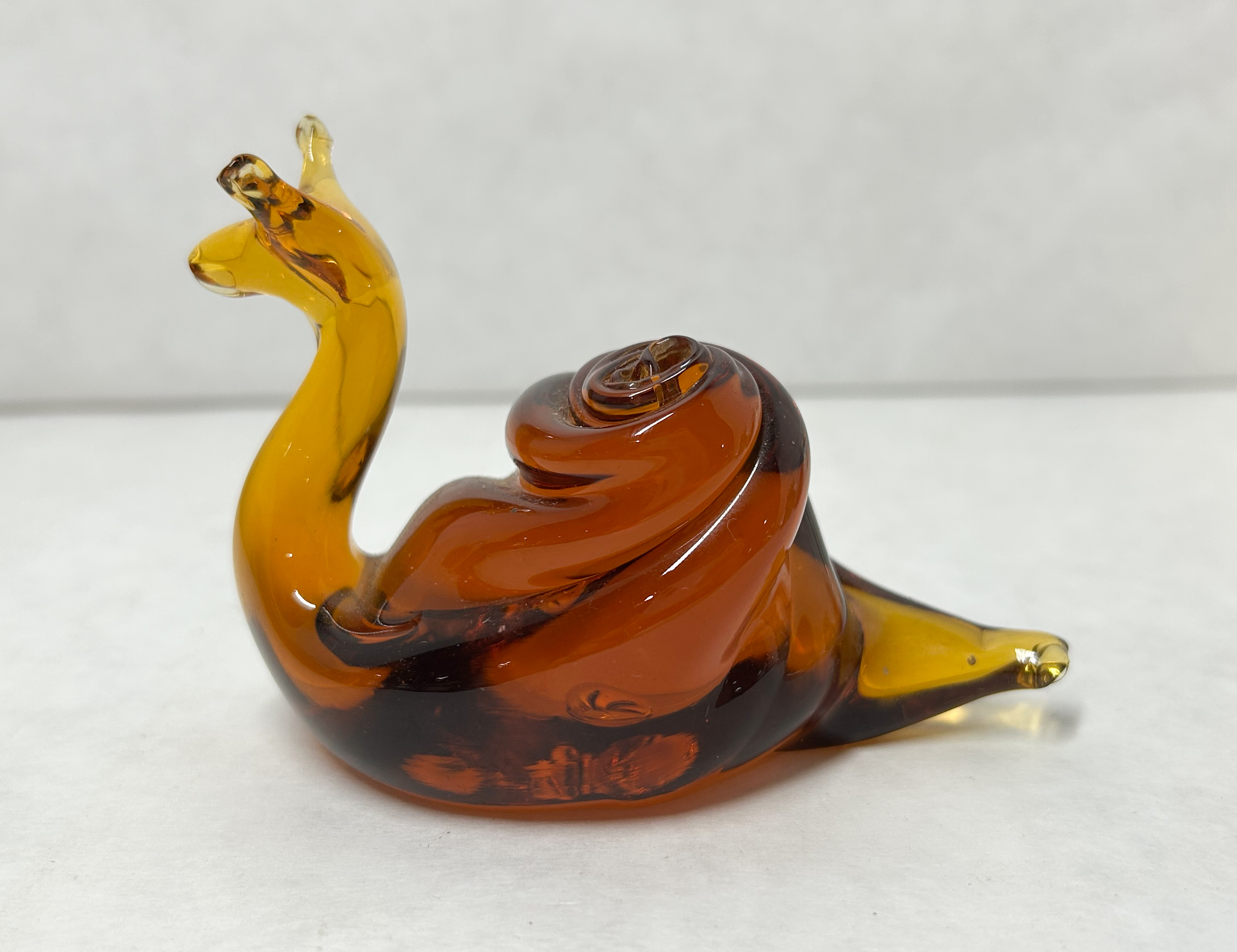 MCM AMBER ART GLASS SNAIL, MID-20TH CENTURY