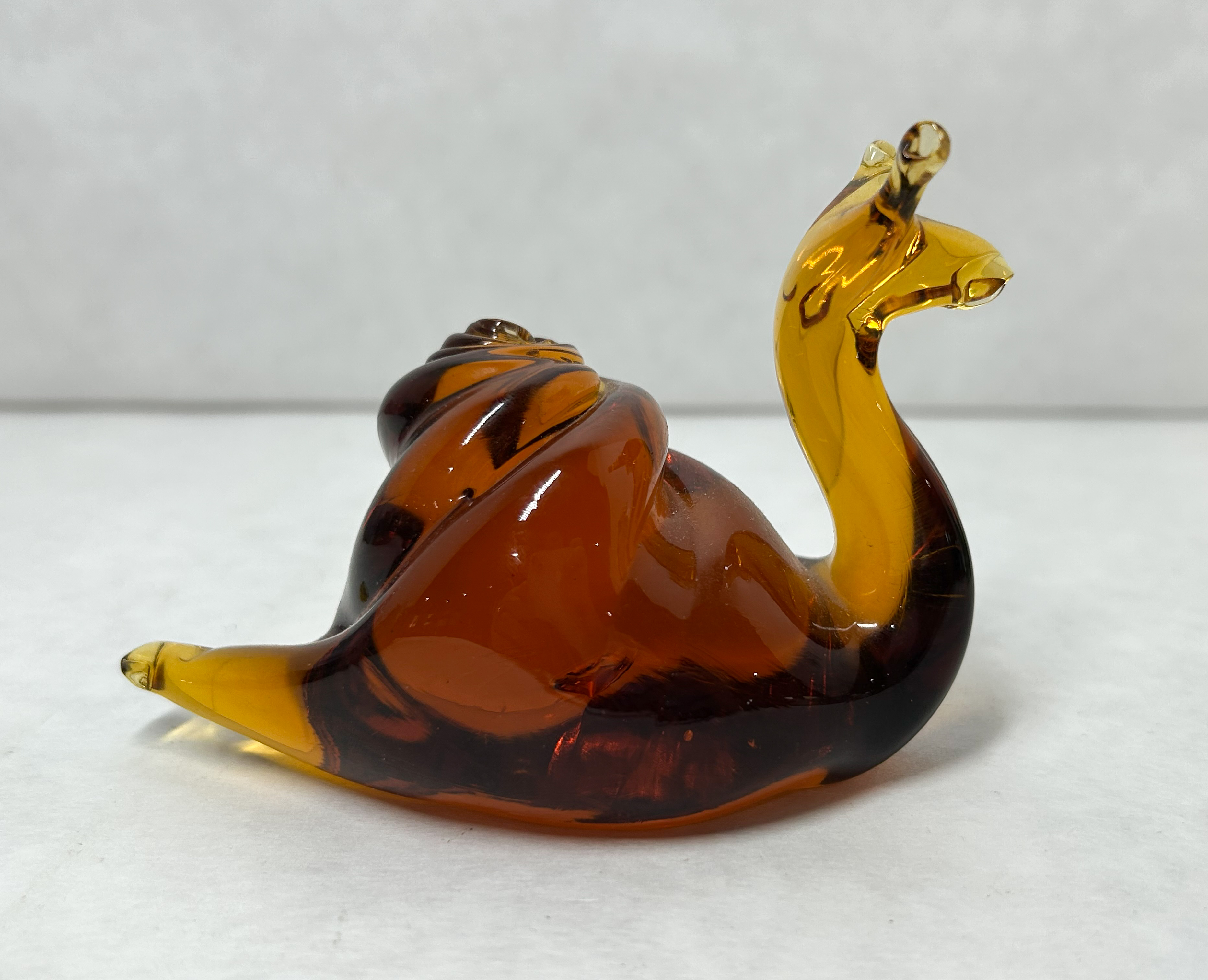 MCM AMBER ART GLASS SNAIL, MID-20TH CENTURY