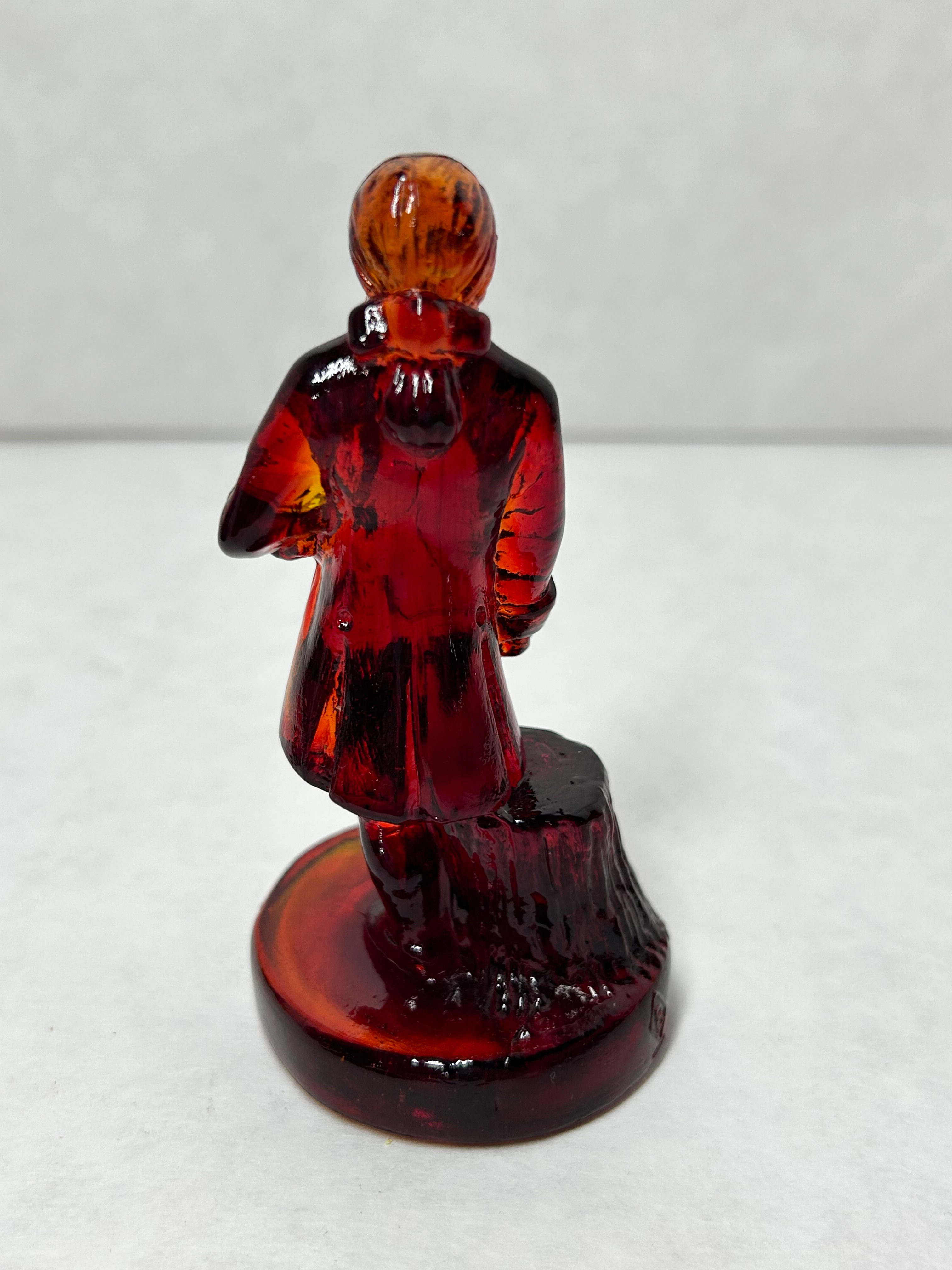 BOYD COLONIAL MAN AMBERINA GLASS FIGURINE