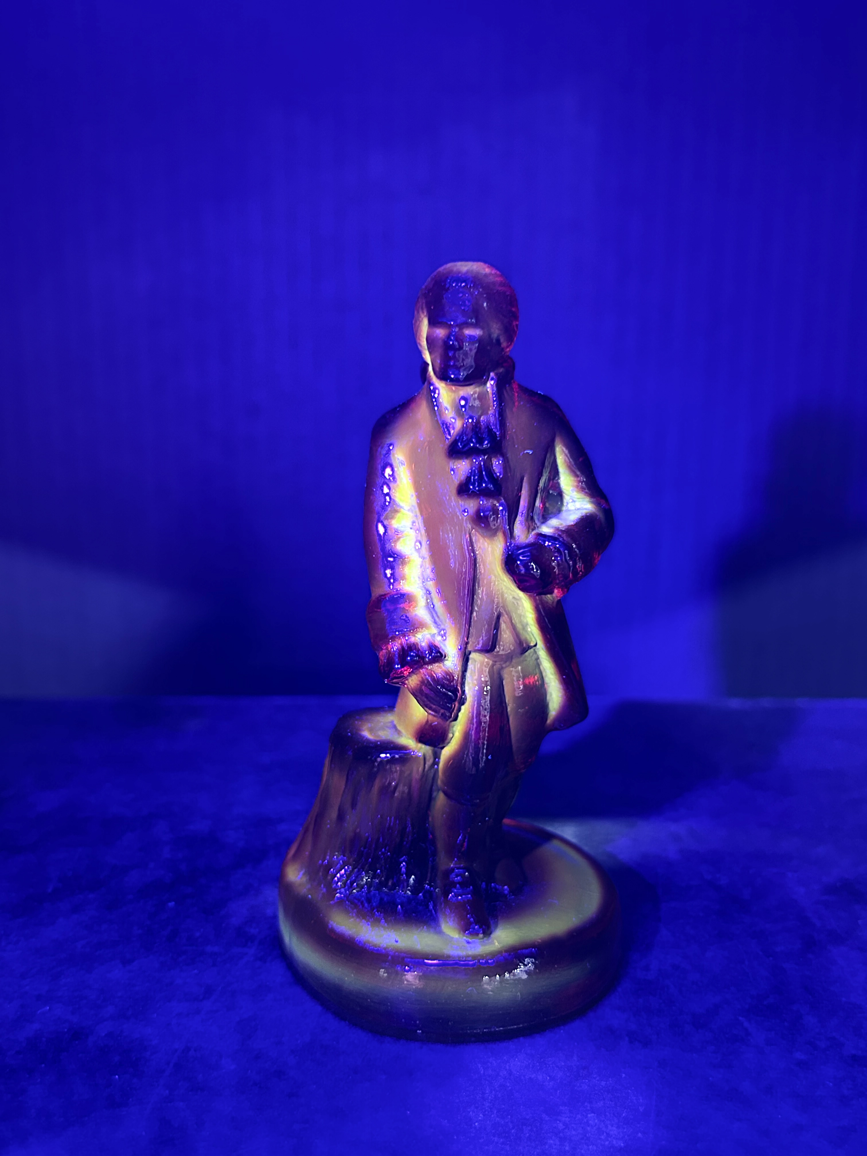 BOYD COLONIAL MAN AMBERINA GLASS FIGURINE