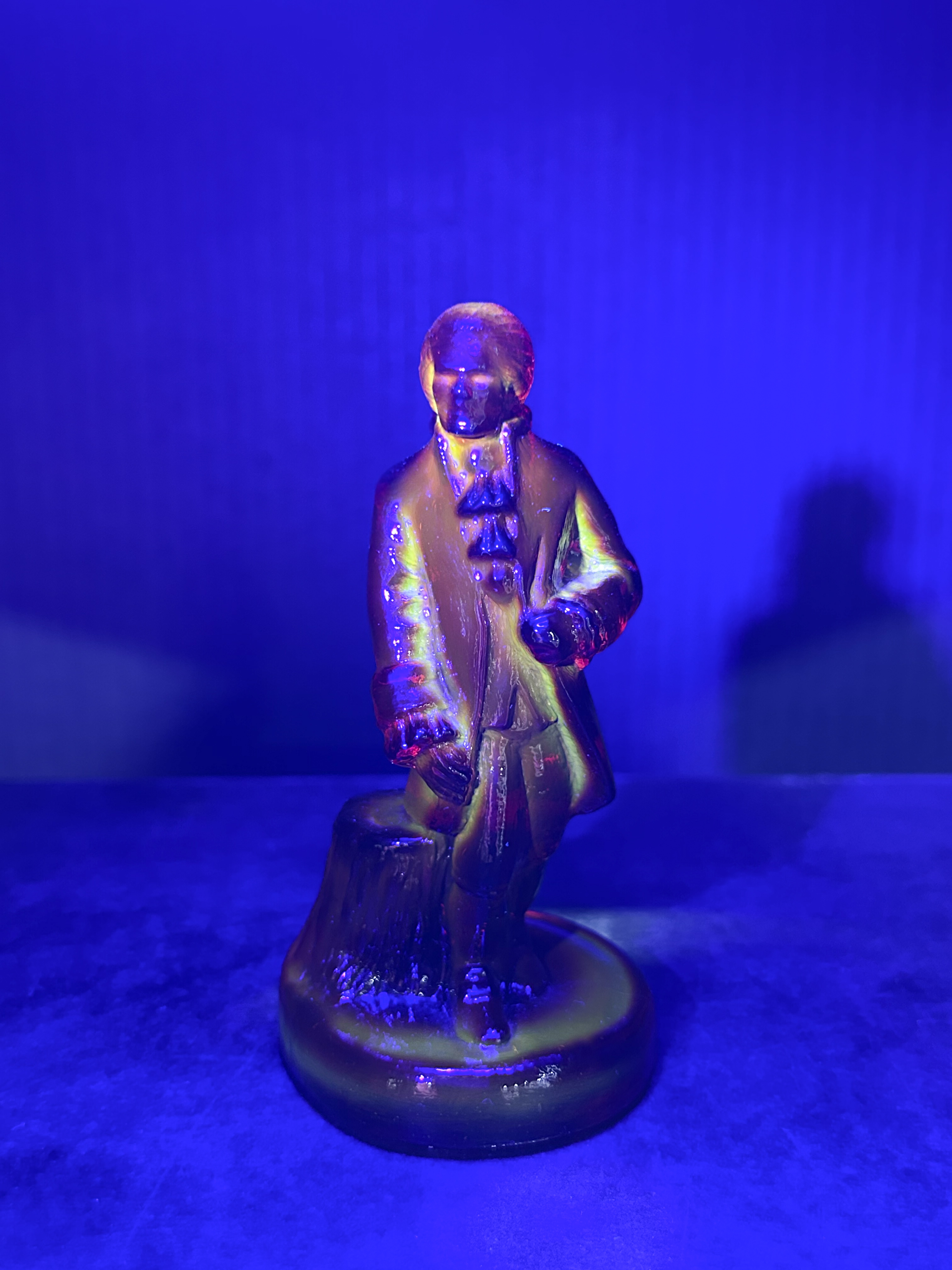 BOYD COLONIAL MAN AMBERINA GLASS FIGURINE