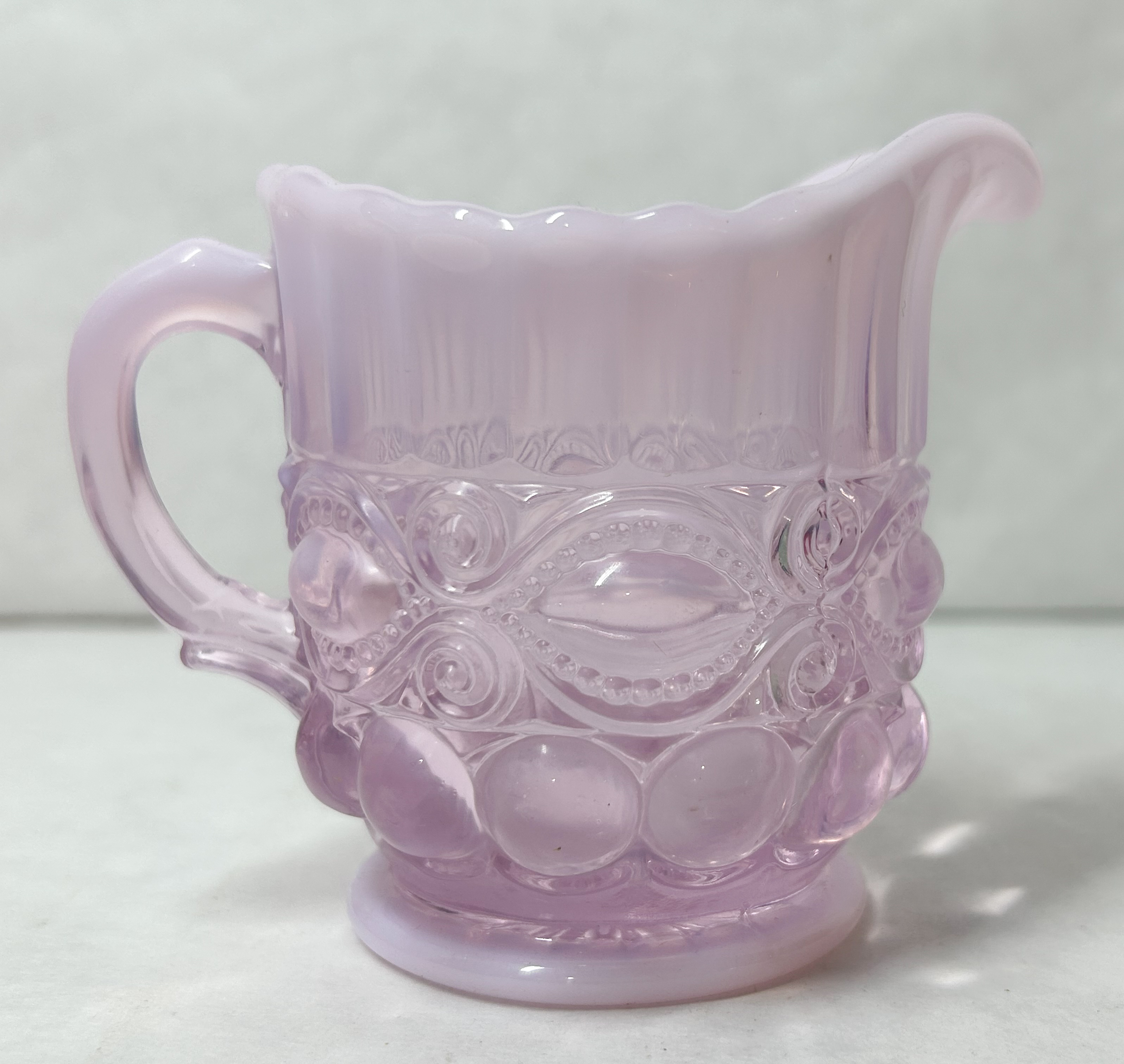 MOSSER PINK SLAG GLASS EYEWINKER CREAMER