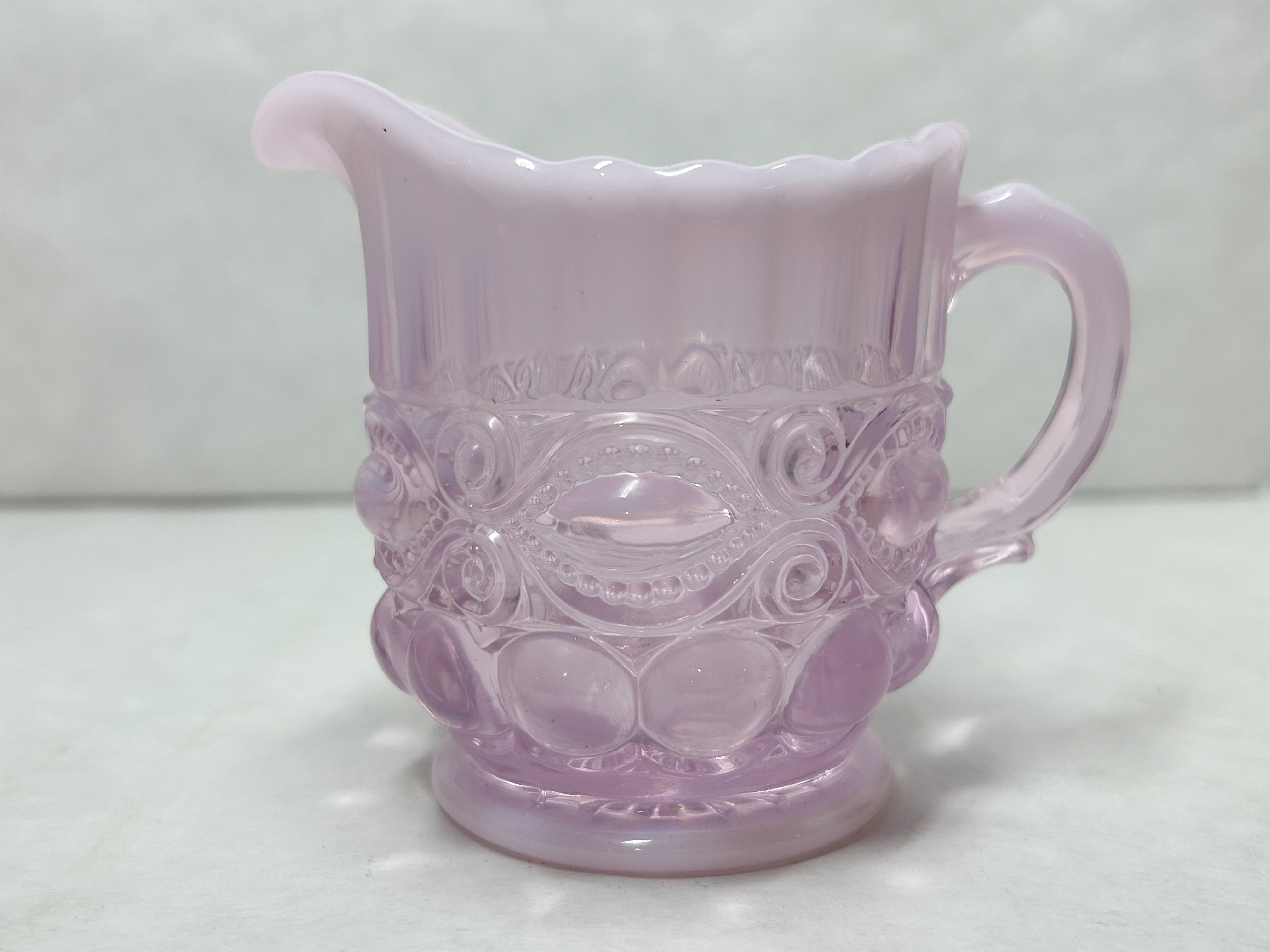 MOSSER PINK SLAG GLASS EYEWINKER CREAMER