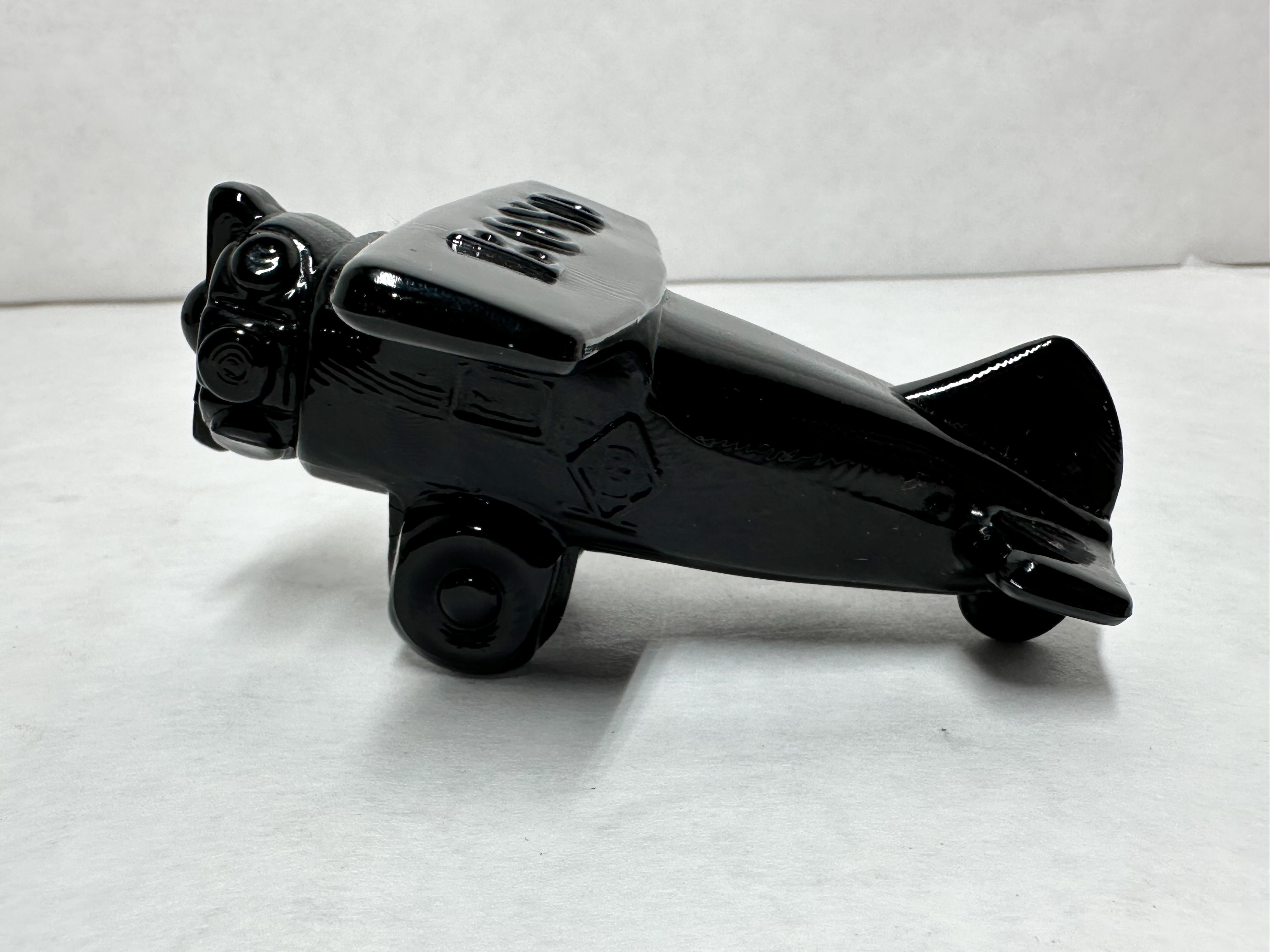 BOYD BLACK GLASS AIRPLANE, CIRCA 1980