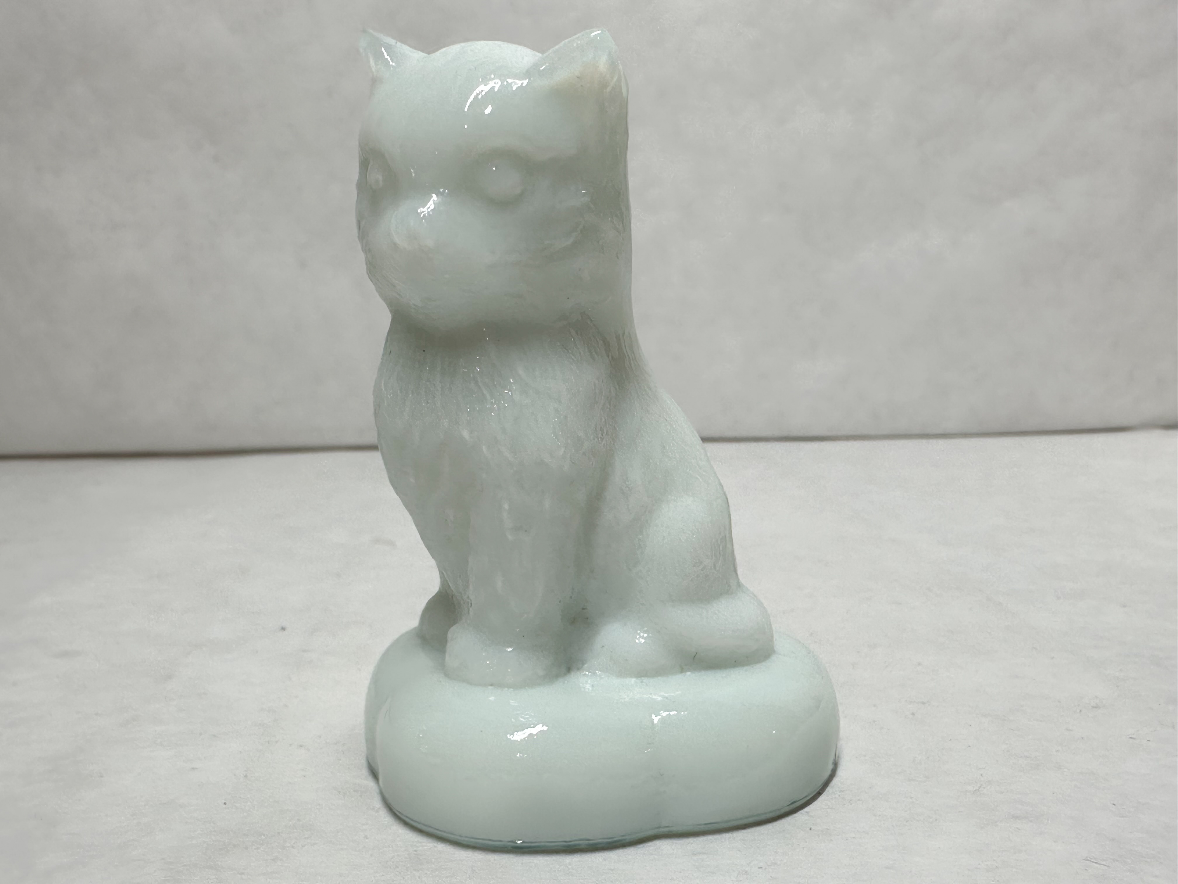 BOYD MILK SITTING KITTEN ON PILLOW