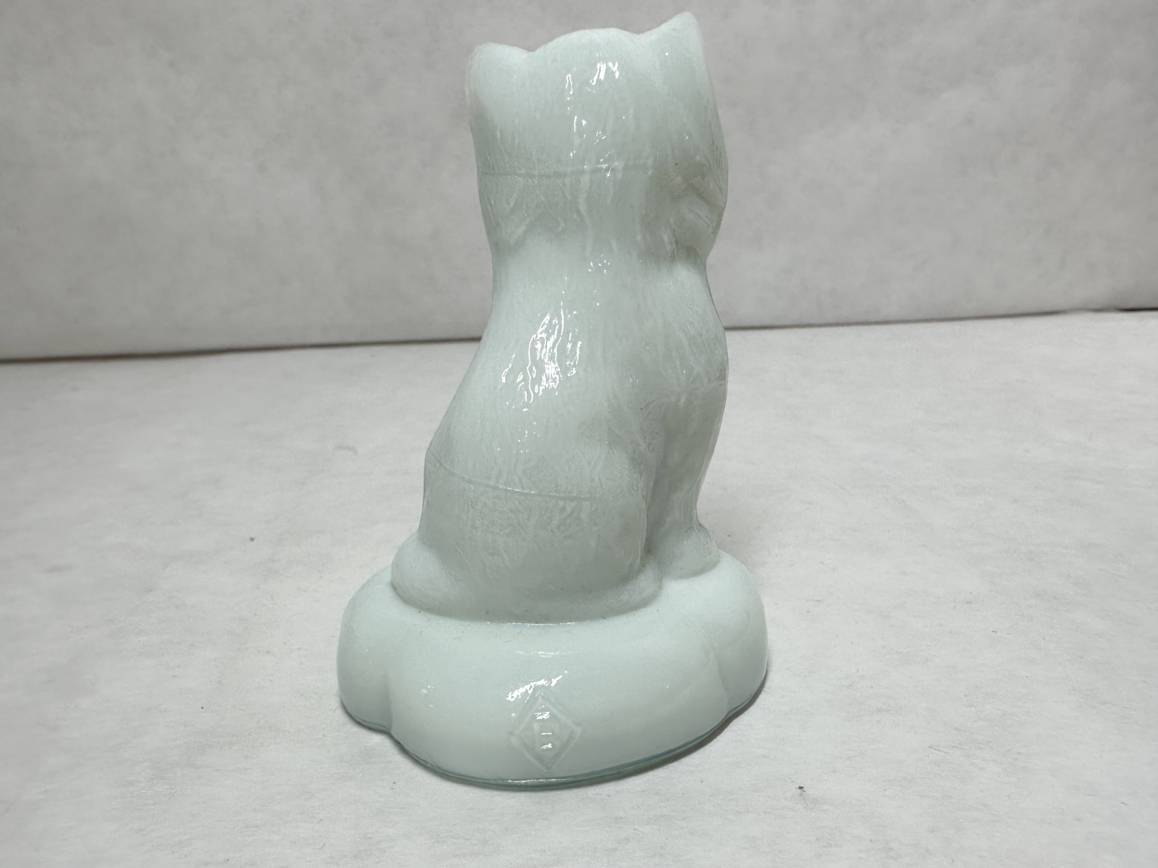 BOYD MILK SITTING KITTEN ON PILLOW