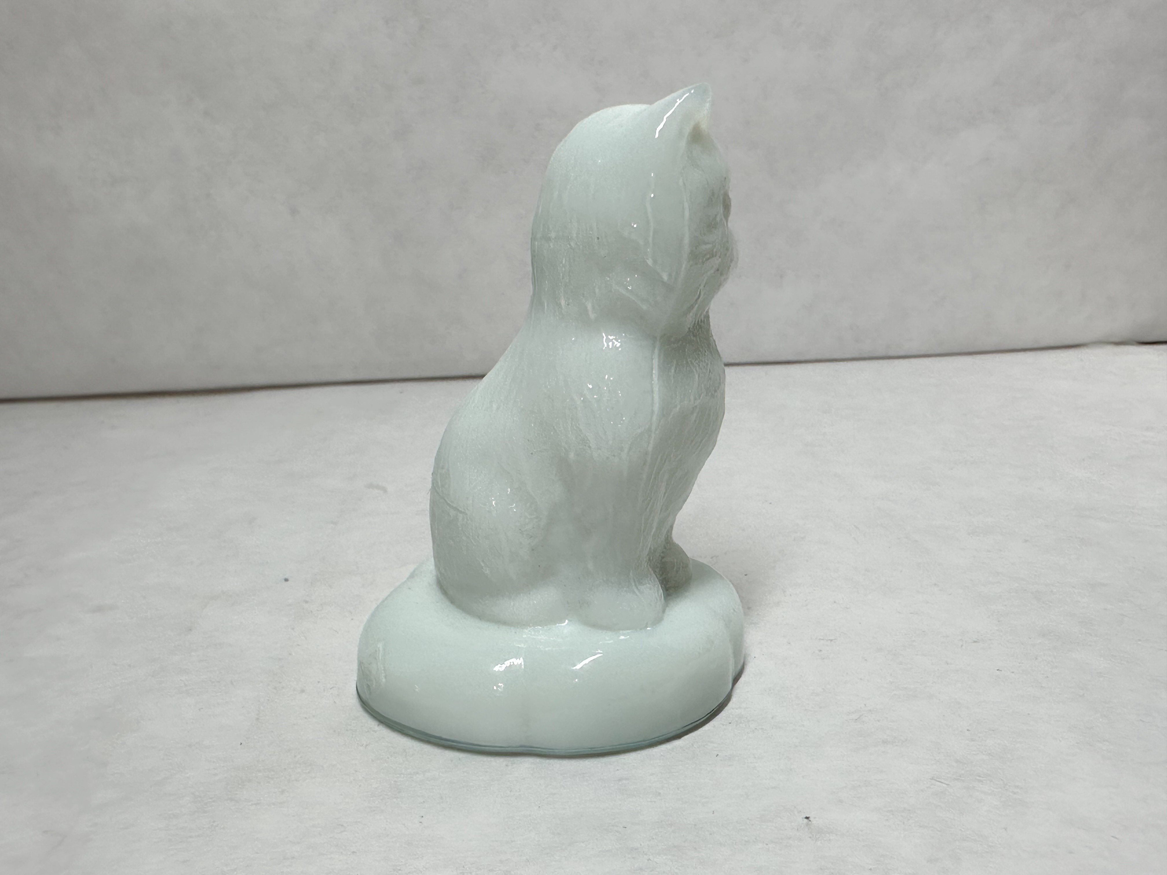 BOYD MILK SITTING KITTEN ON PILLOW