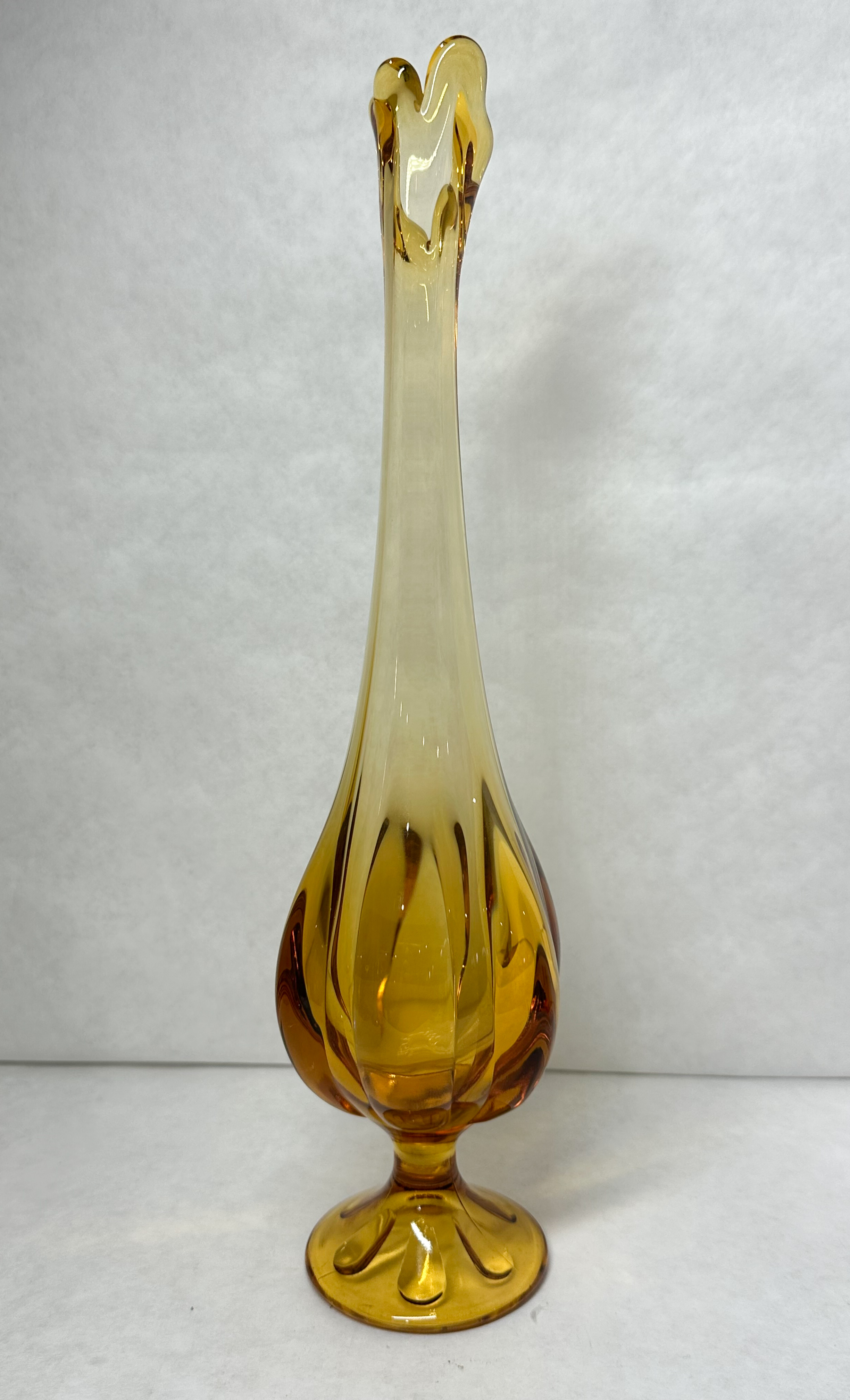MID-CENTURY AMBER SWUNG GLASS VASE