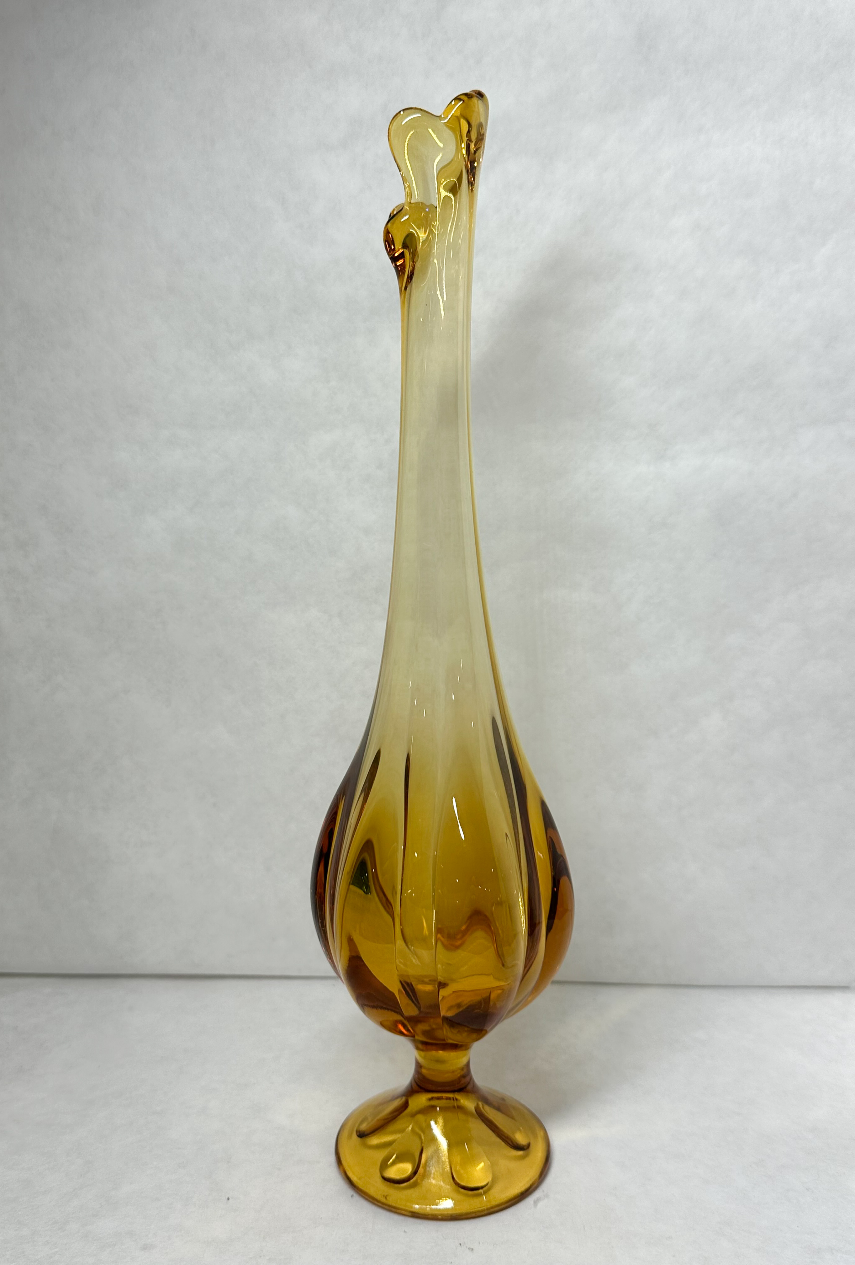 MID-CENTURY AMBER SWUNG GLASS VASE