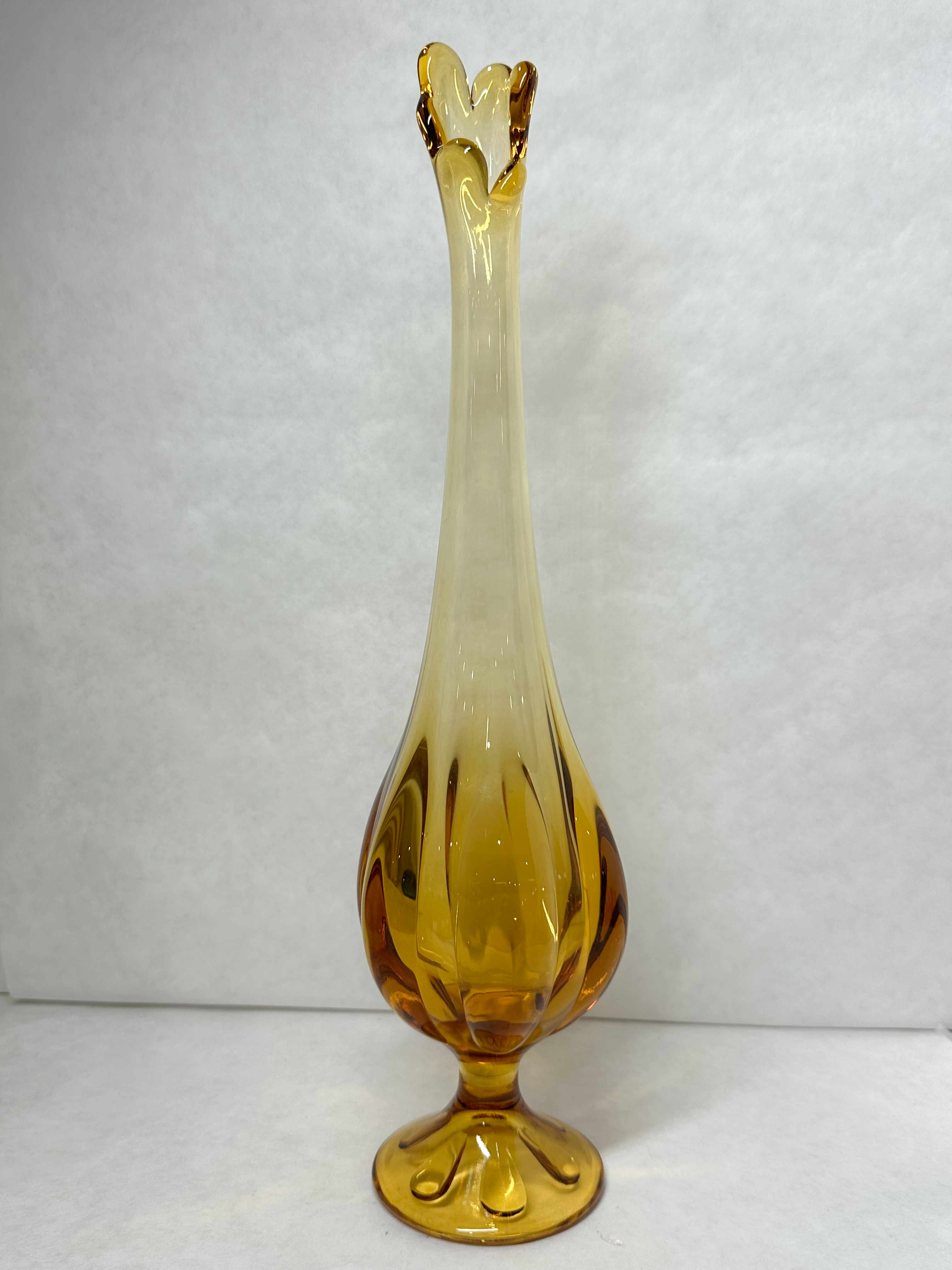 MID-CENTURY AMBER SWUNG GLASS VASE