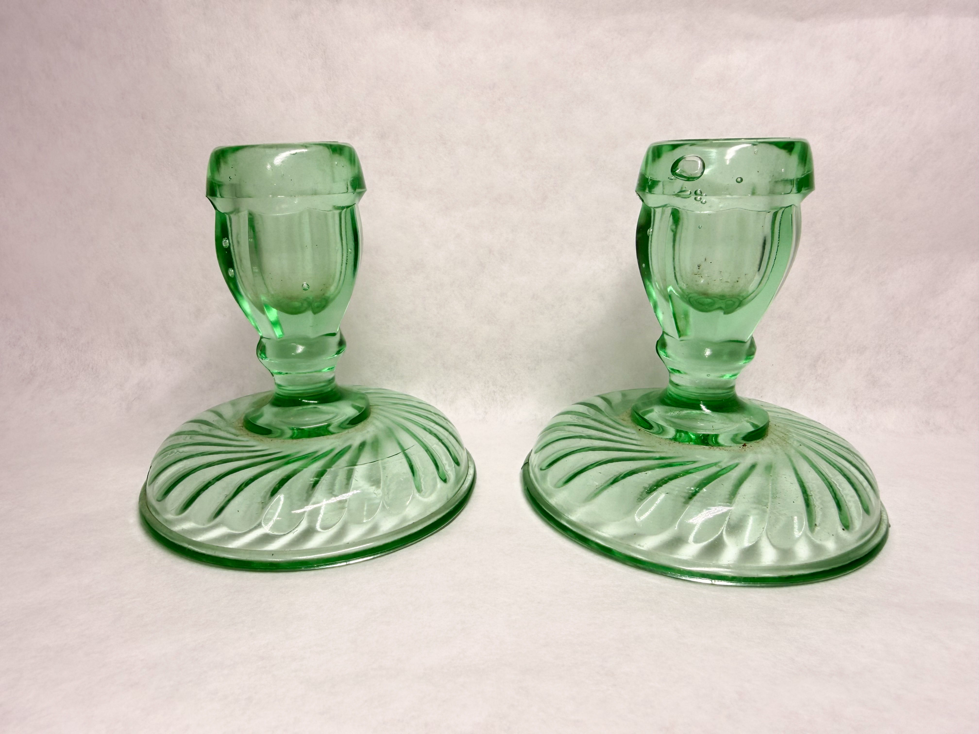 PAIR OF GREEN URANIUM GLASS SWIRL CANDLESTICKS