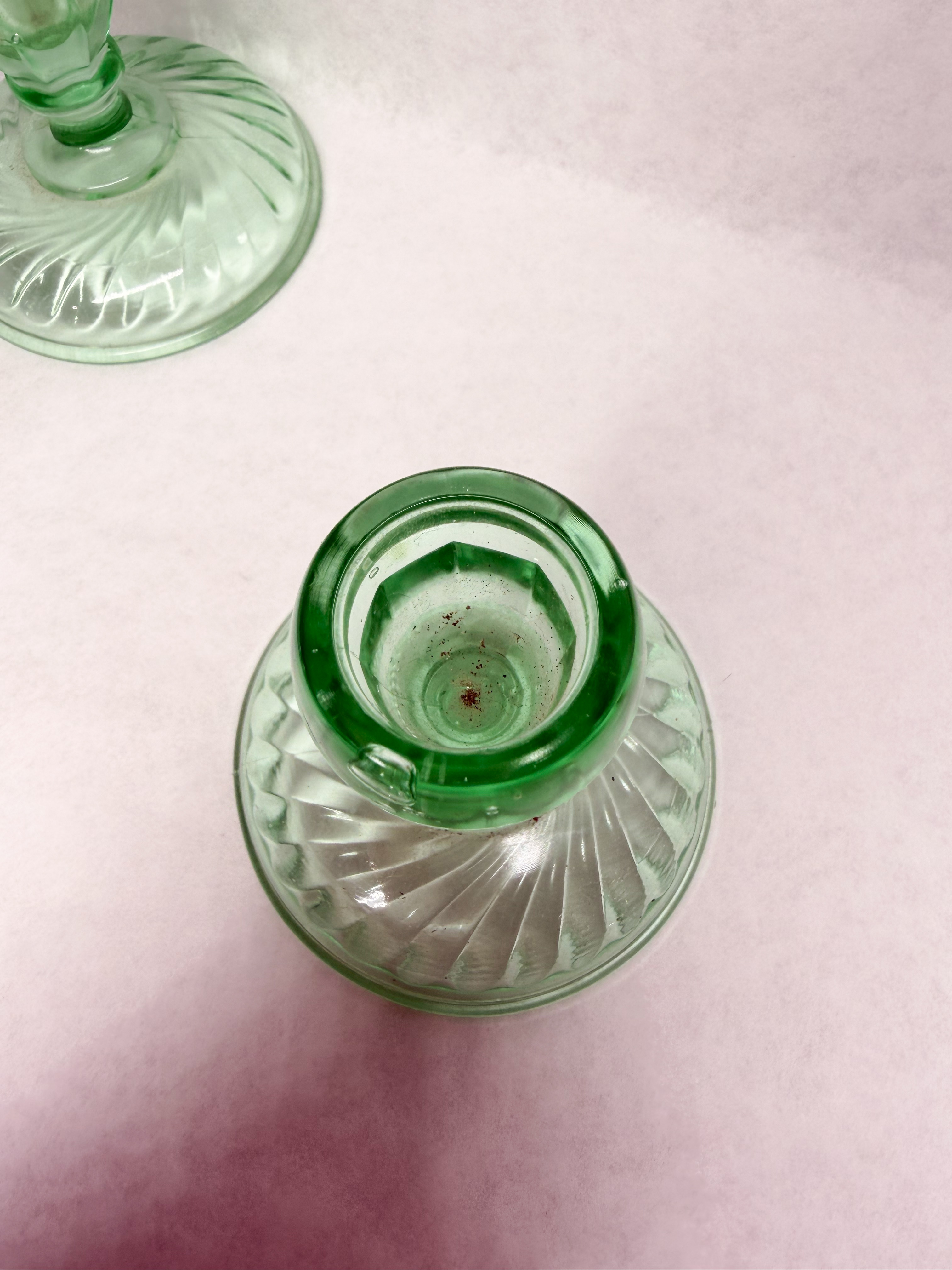 PAIR OF GREEN URANIUM GLASS SWIRL CANDLESTICKS