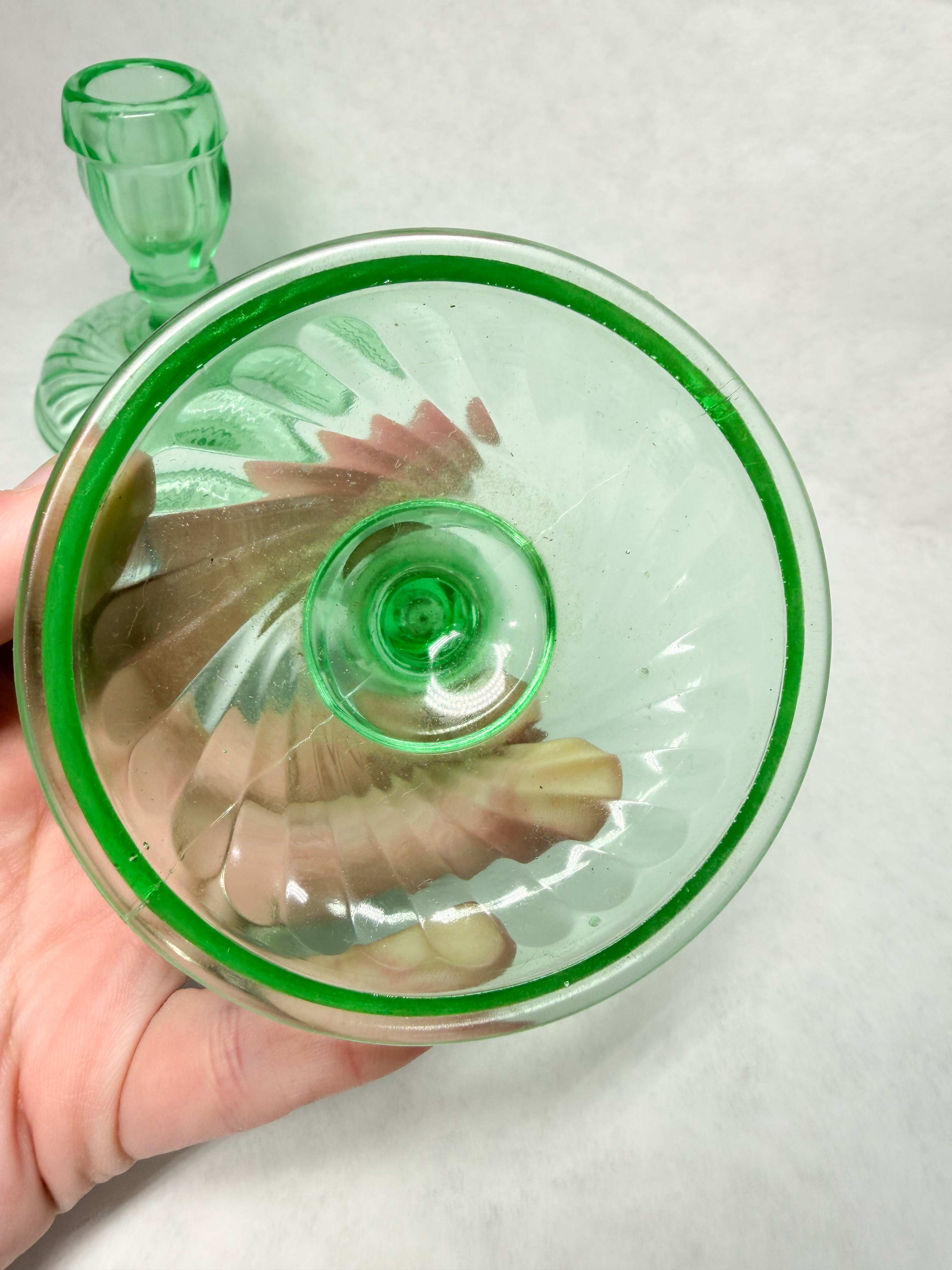 PAIR OF GREEN URANIUM GLASS SWIRL CANDLESTICKS