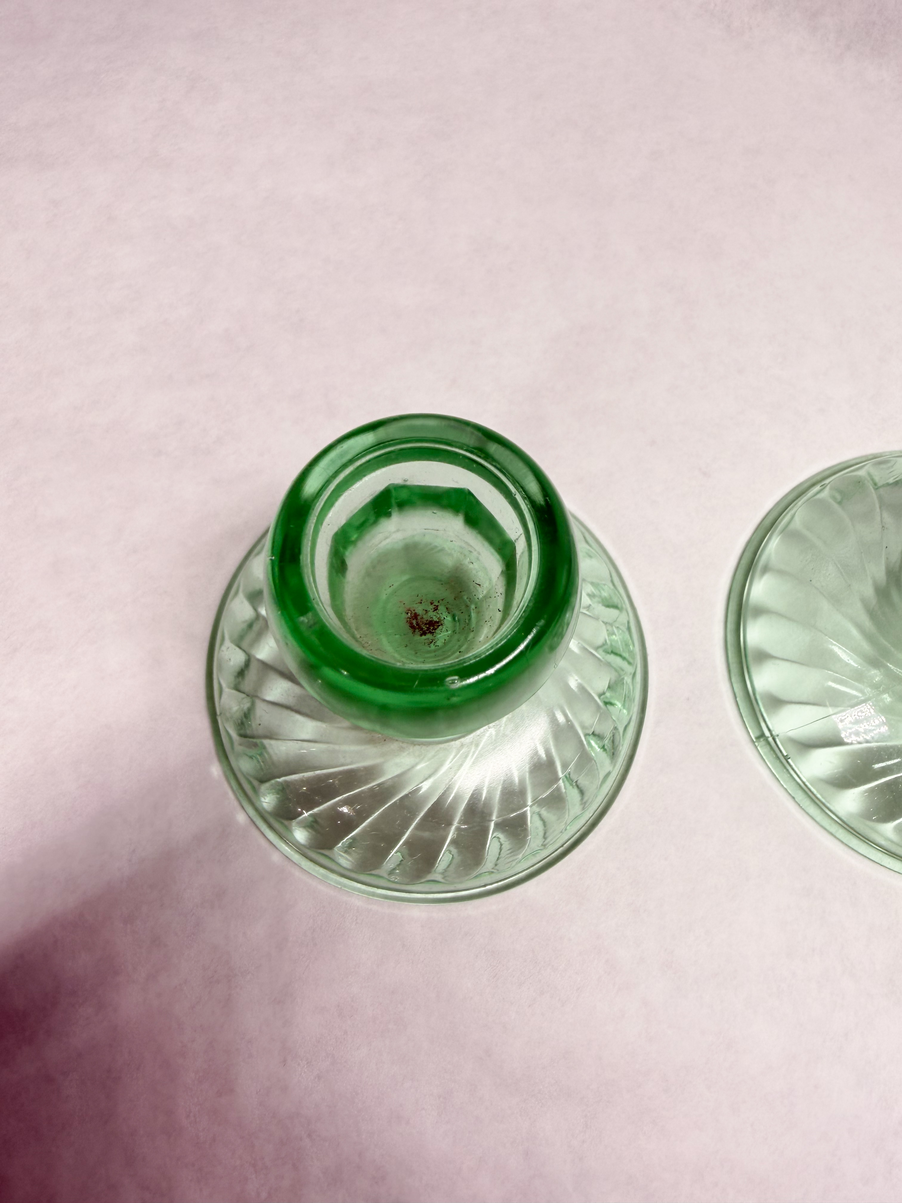 PAIR OF GREEN URANIUM GLASS SWIRL CANDLESTICKS