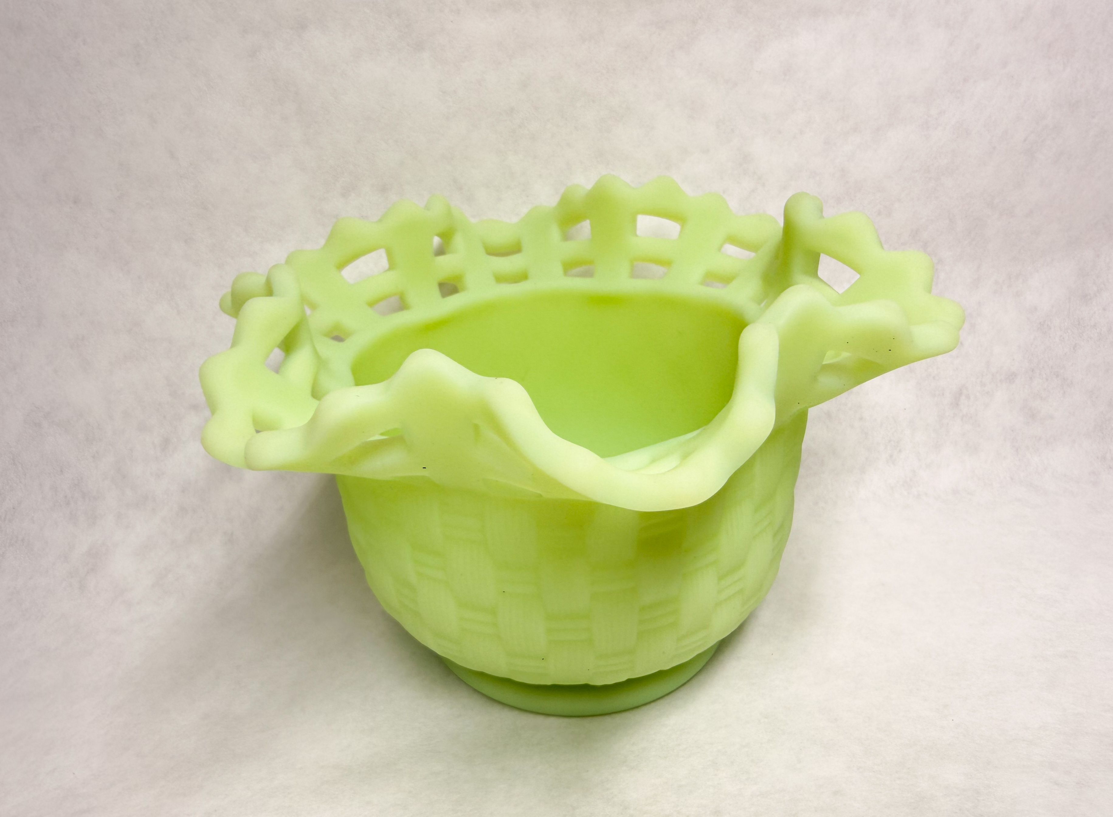 URANIUM CUSTARD GLASS BASKETWEAVE BOWL, 1950s