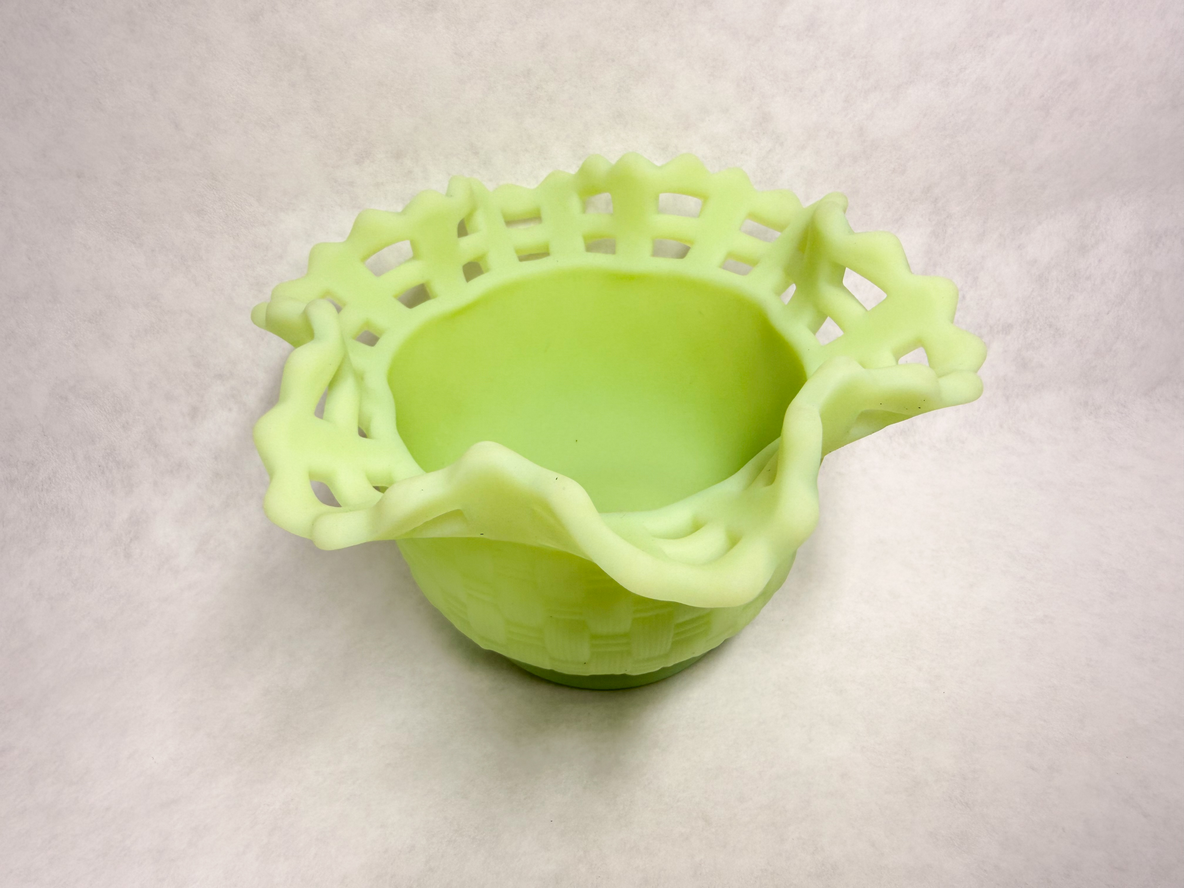 URANIUM CUSTARD GLASS BASKETWEAVE BOWL, 1950s