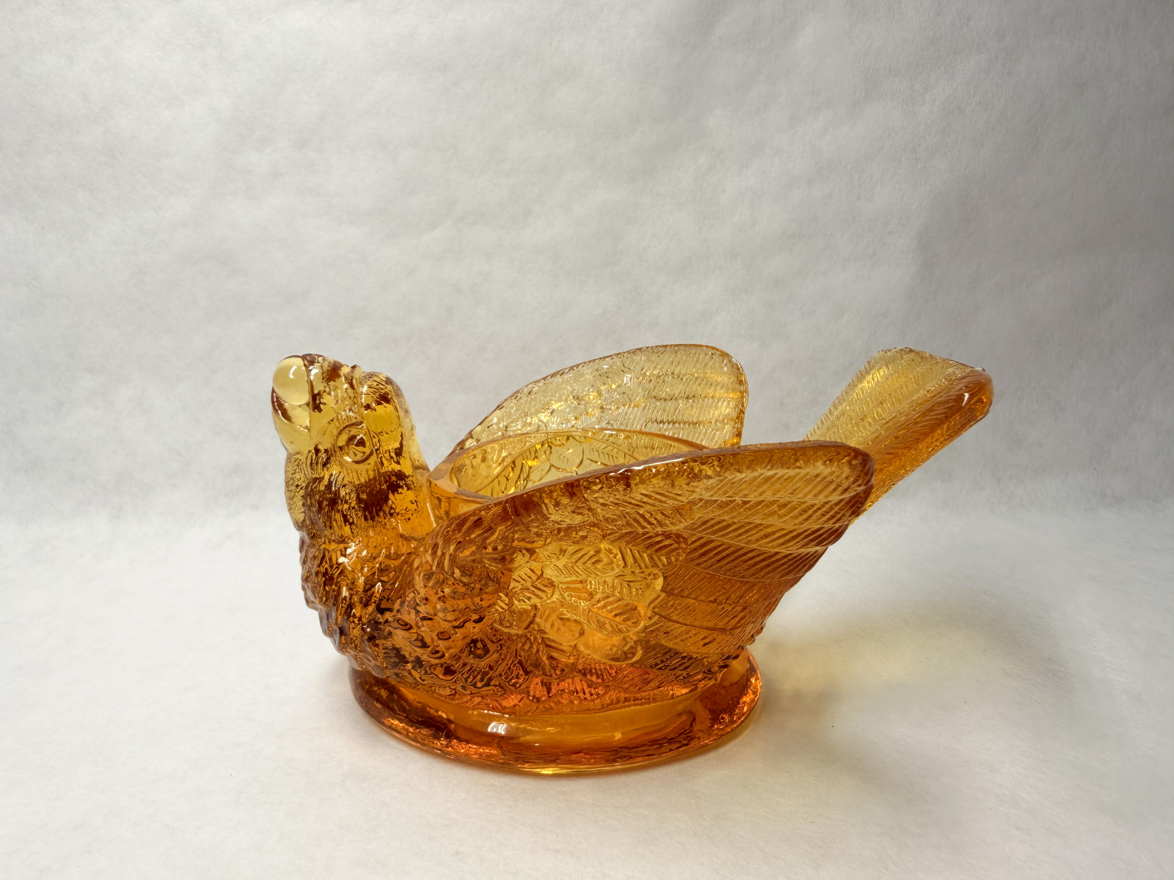 AMBER GLASS BIRD SALT CELLAR, MID-20TH CENTURY