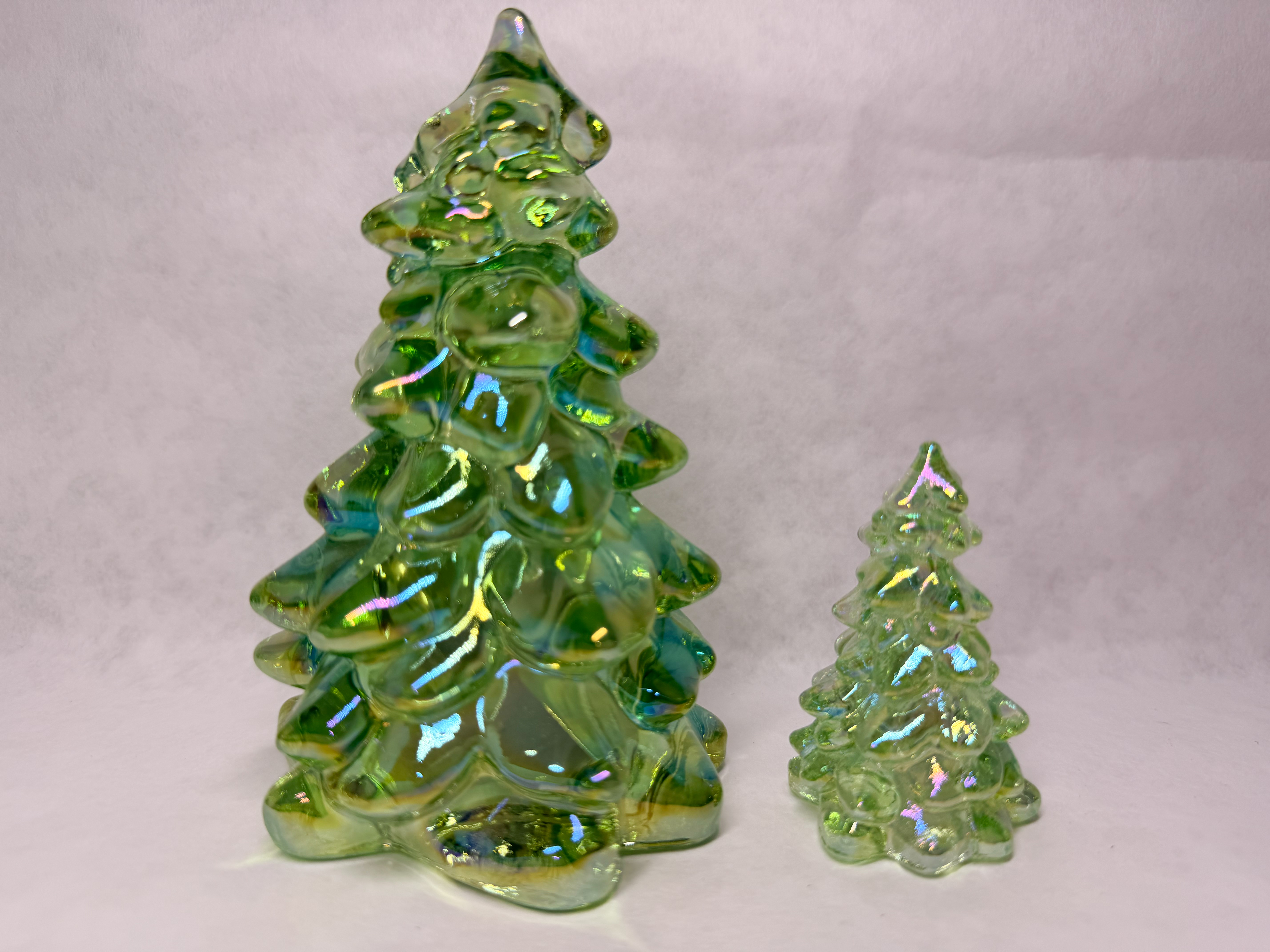 MOSSER PAIR OF IRIDESCENT GREEN GLASS TREES