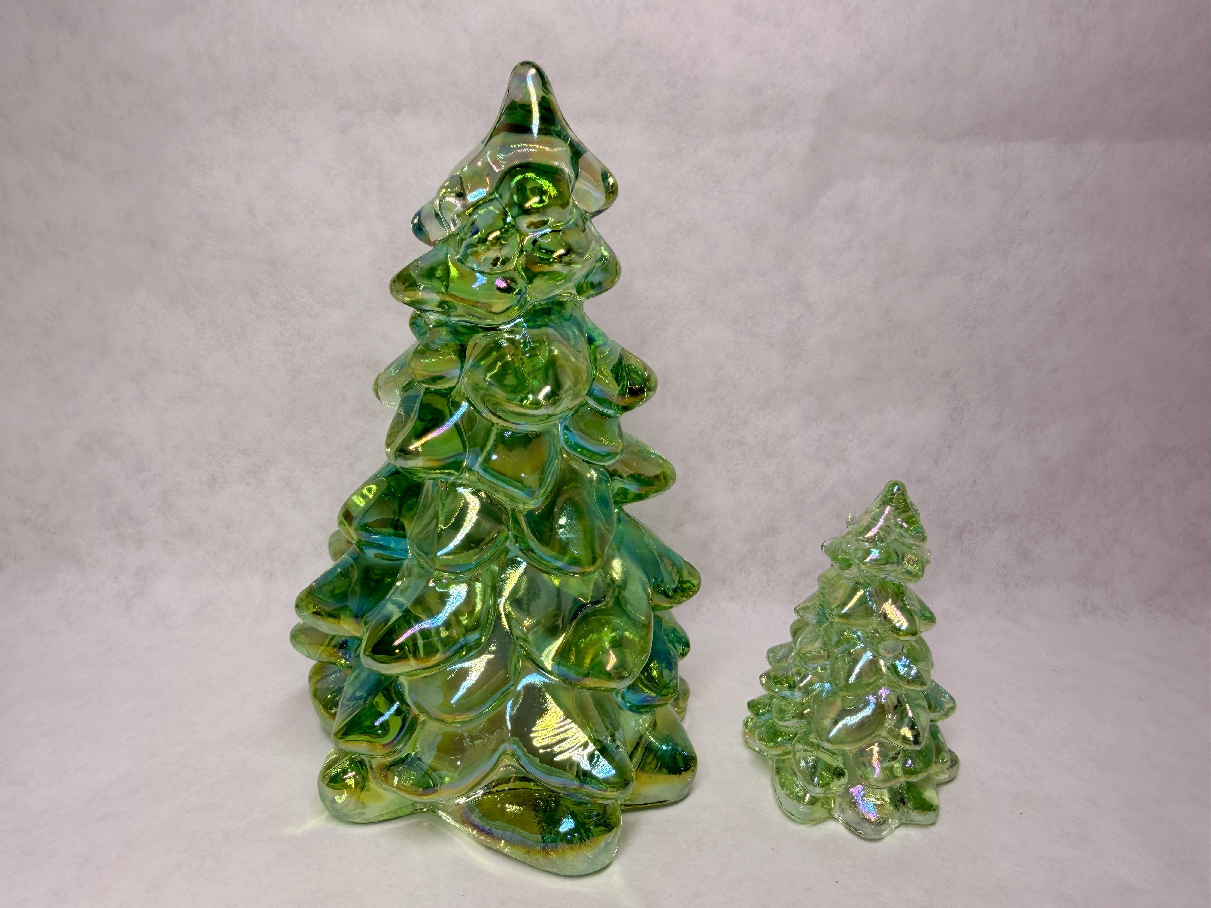 MOSSER PAIR OF IRIDESCENT GREEN GLASS TREES