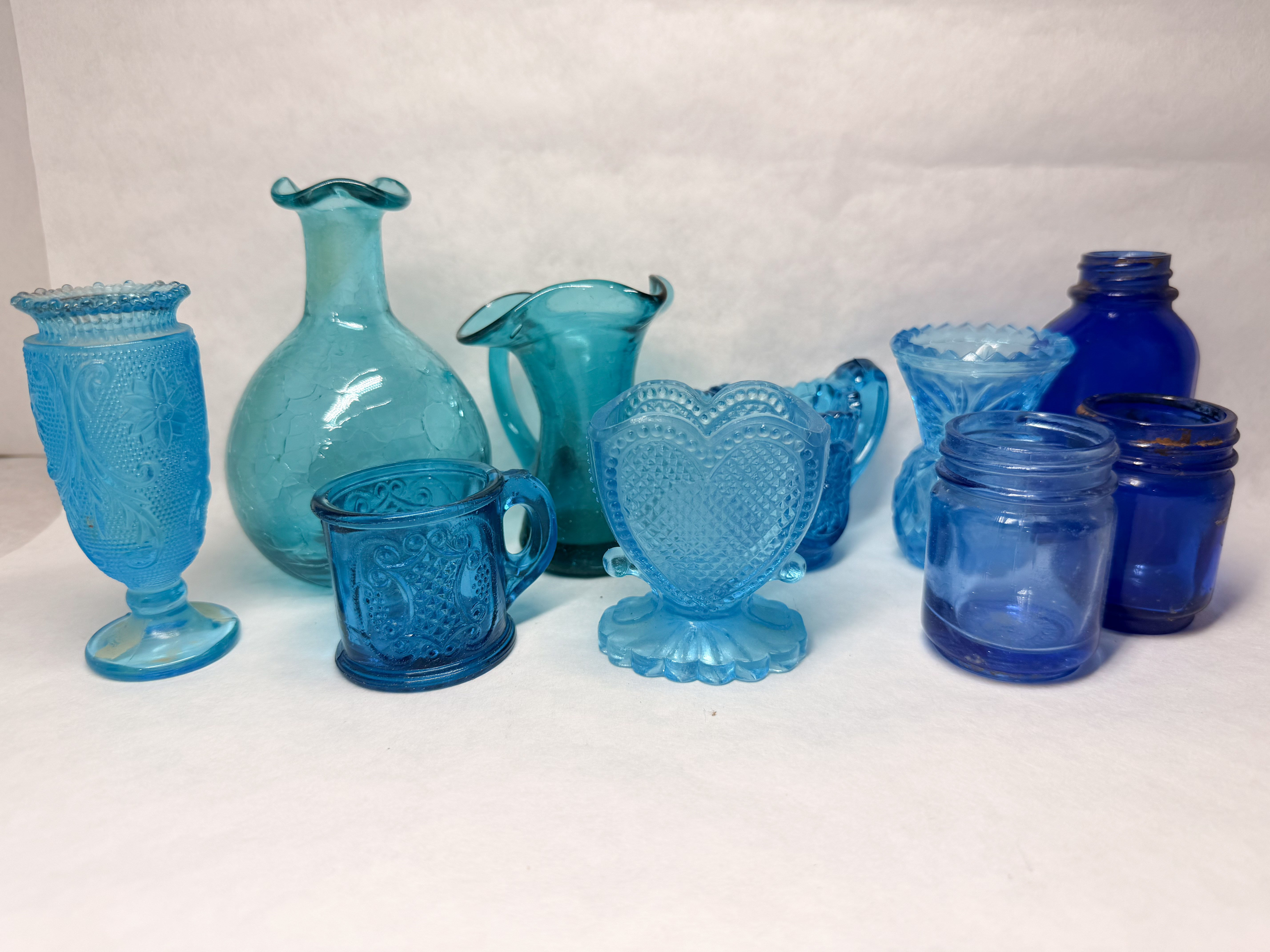 COLLECTION OF TEN BLUE GLASS PIECES