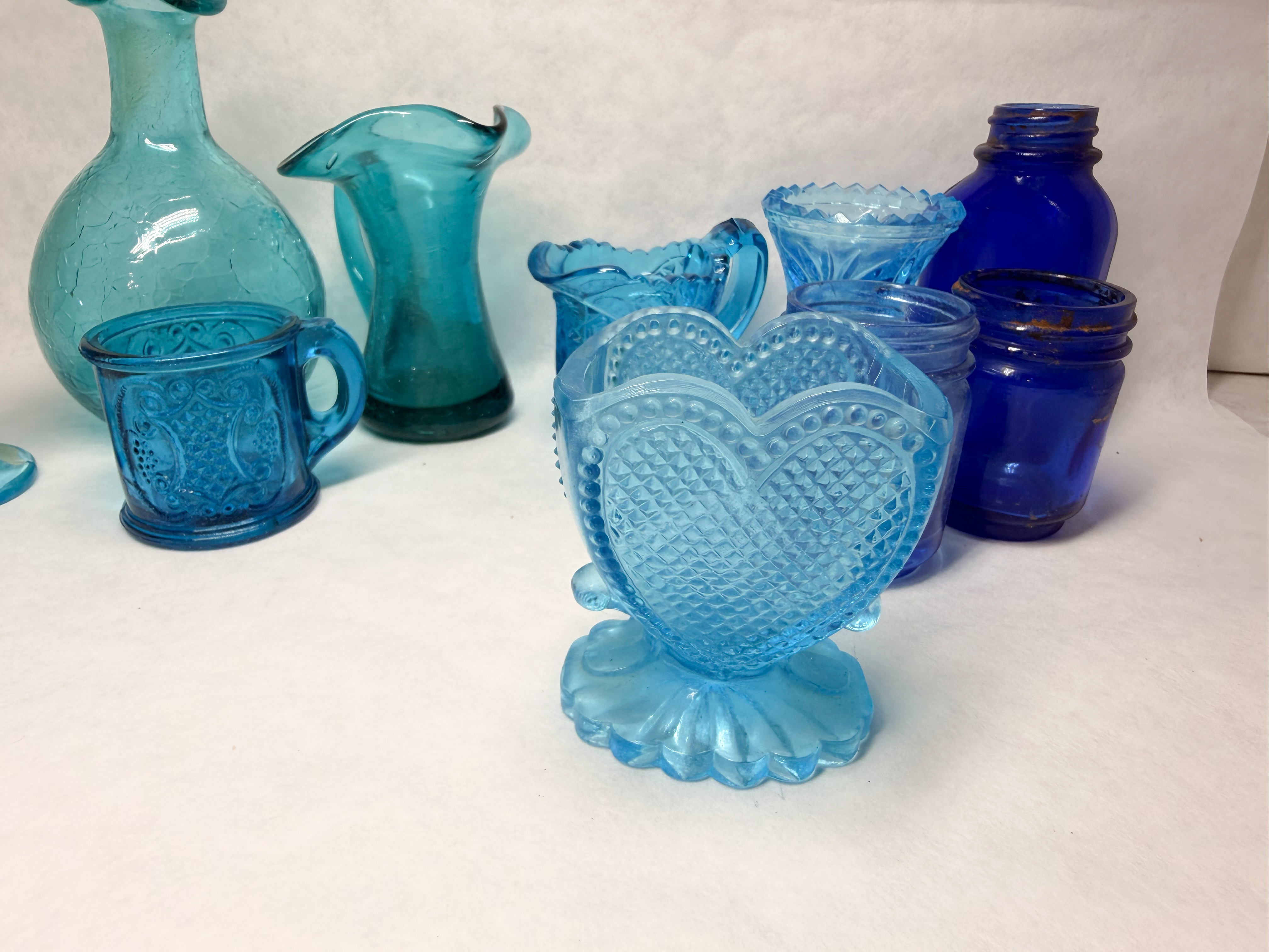 COLLECTION OF TEN BLUE GLASS PIECES