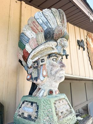 MESOAMERICAN BUST, CAST STONE, MID-20TH CENTURY. Cast stone bust of a Mesoamerican figure 