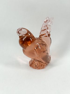 IMPERIAL PINK GLASS ROOSTER, CIRCA 1975. Pink pressed glass rooster figurine manufactured by the 