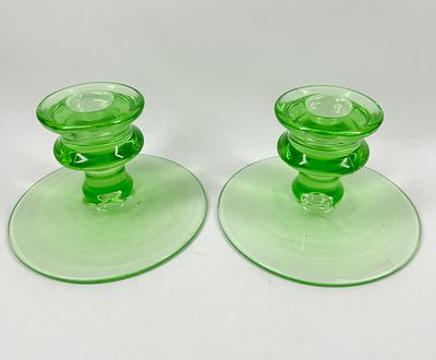 GREEN URANIUM GLASS CANDLESTICKS, 1930S. A matching pair of low-profile Depression-era 