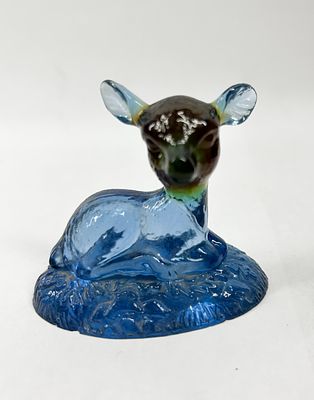 BOYD MULTICOLOR BINGO DEER. A reclining fawn figurine crafted from bicolor translucent blue and 