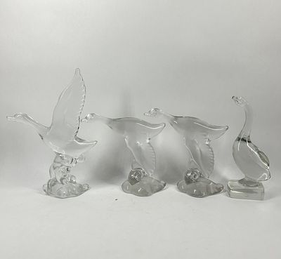 HEISEY MALLARD COLLECTION. A collection of clear glass waterfowl figurines. The figures are 