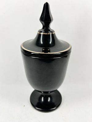BLACK GLASS LIDDED TROPHY URN, FENTON. Opaque black glass lidded trophy urn featuring 
