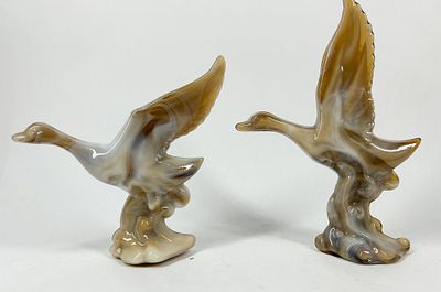 IMPERIAL CARAMEL SLAG GLASS GEESE. A pair of caramel slag glass figurines depicting geese in 