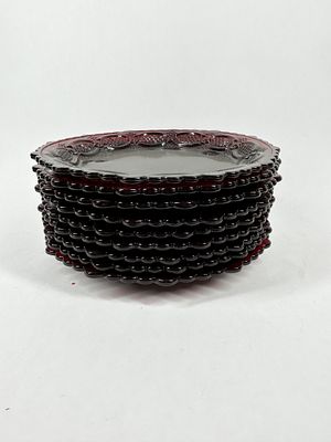 AVON RUBY RED SALAD PLATES, 1970S. A set of ten Avon ruby red pressed glass salad plates in the 