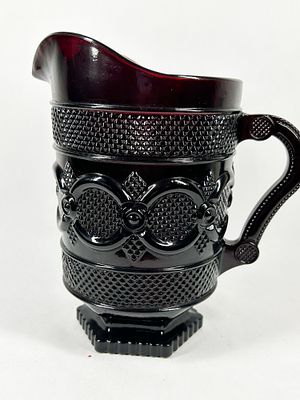 AVON RUBY GLASS CAPE COD PITCHER. Pressed ruby red glass water pitcher in the 1876 Cape Cod 