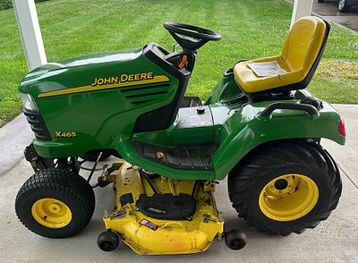 JOHN DEERE X465 WITH BELLY MOWER. 408 HOURS, GARAGE KEPT, RUNS AND OPERATES MACHINE SERIAL 