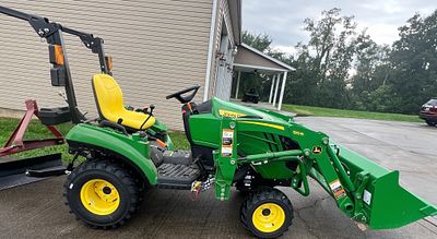 JOHN DEERE 120R W/ LOADER & BUCKET ONLY 16.9 HOURS. VERY LOW HOUR MACHINE THATS BEEN GARAGE 
