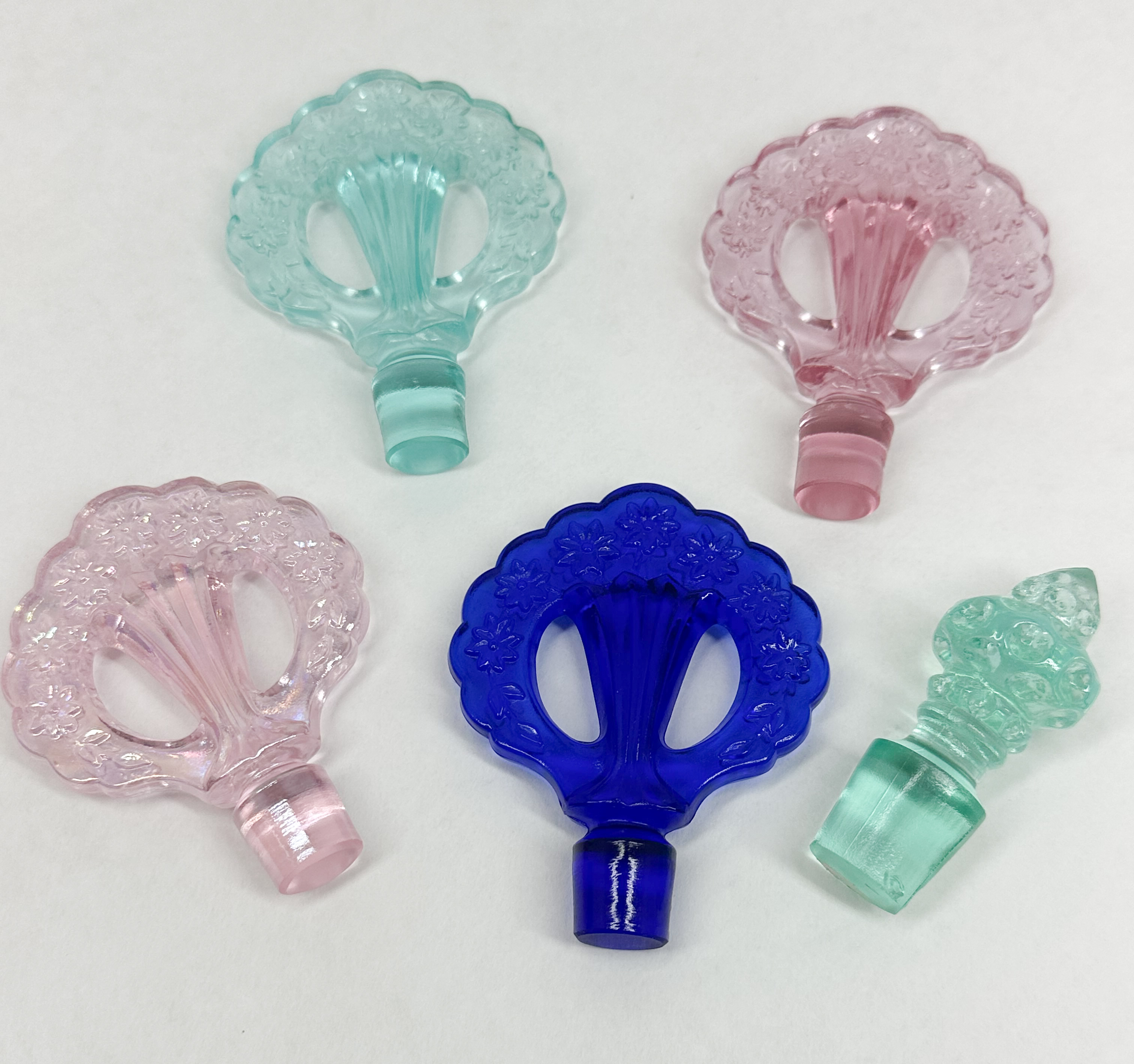 GLASS PERFUME STOPPERS, MID-20TH CENTURY