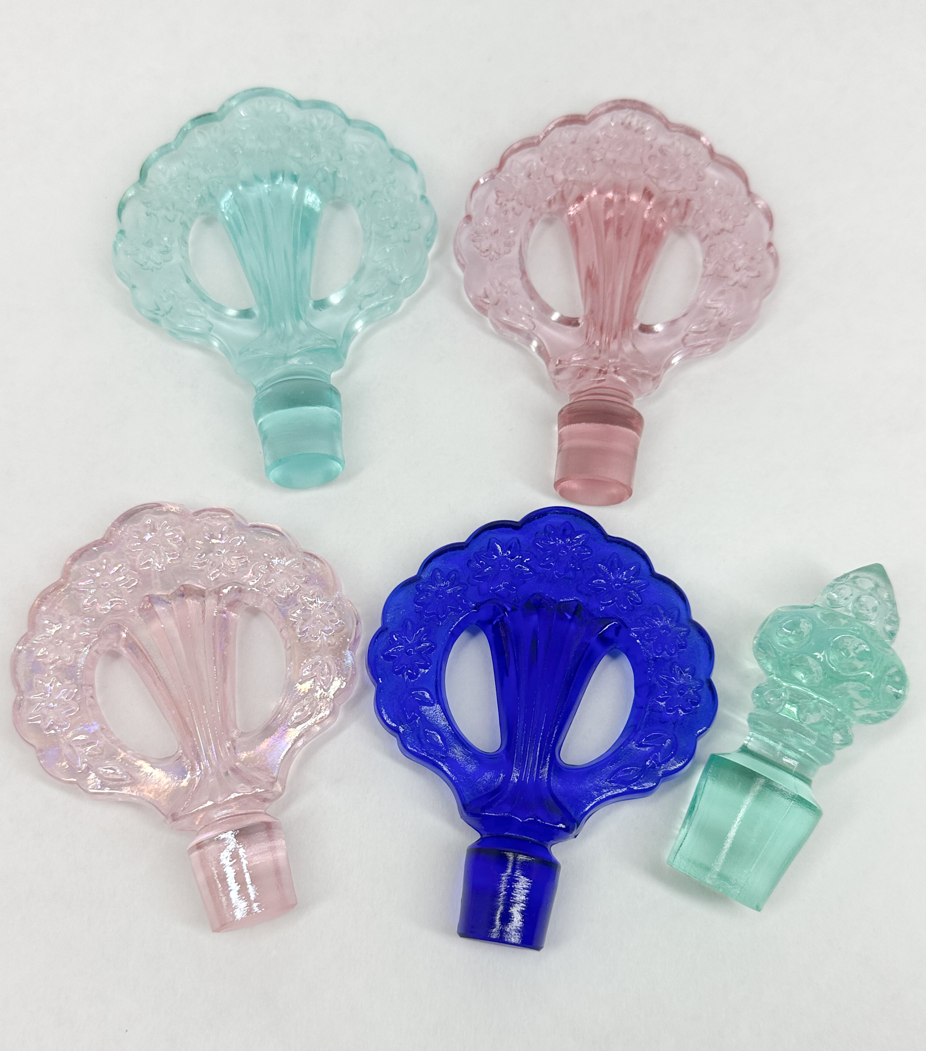 GLASS PERFUME STOPPERS, MID-20TH CENTURY