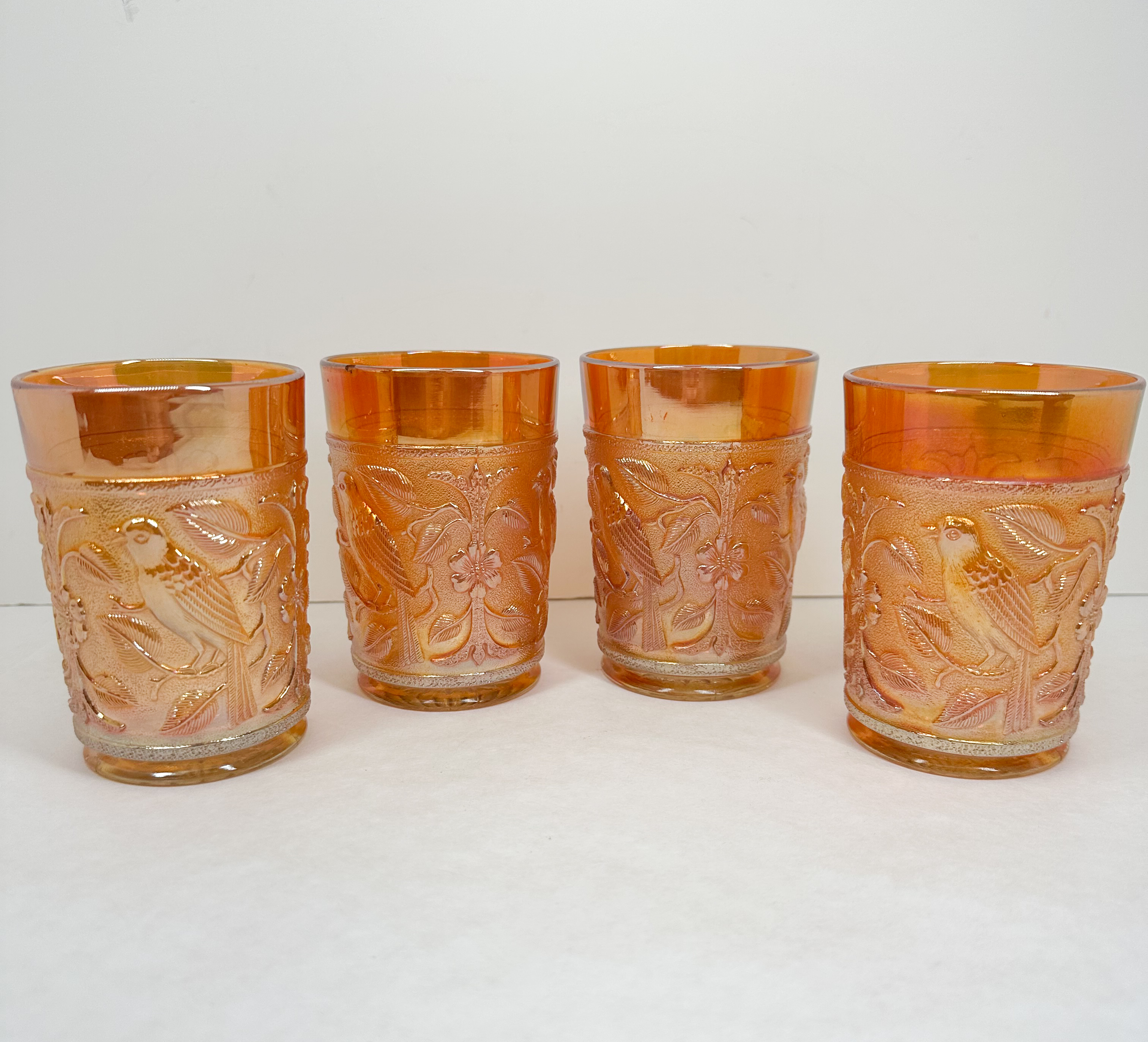 SET OF FOUR MARIGOLD CARNIVAL GLASS TUMBLERS