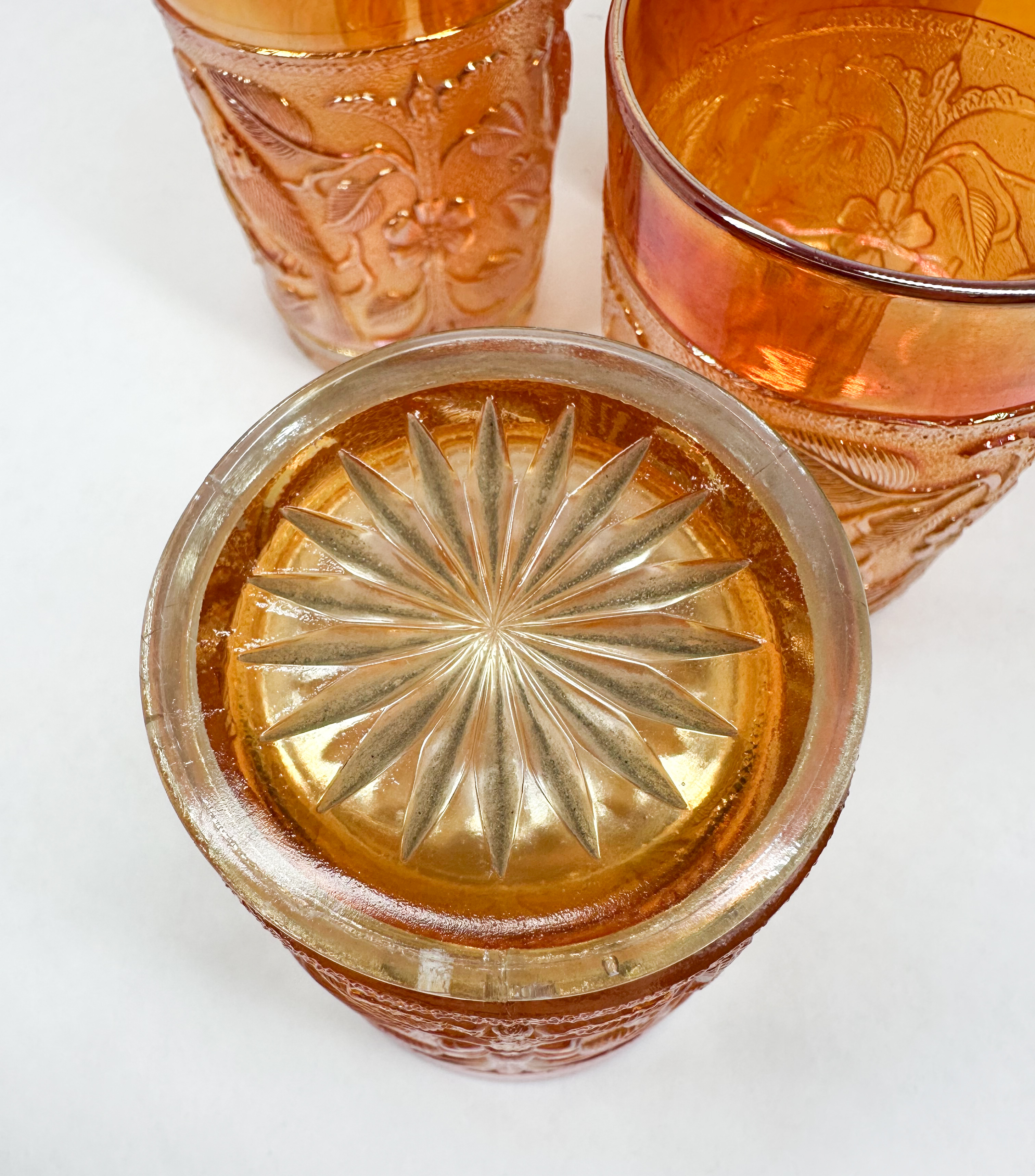 SET OF FOUR MARIGOLD CARNIVAL GLASS TUMBLERS