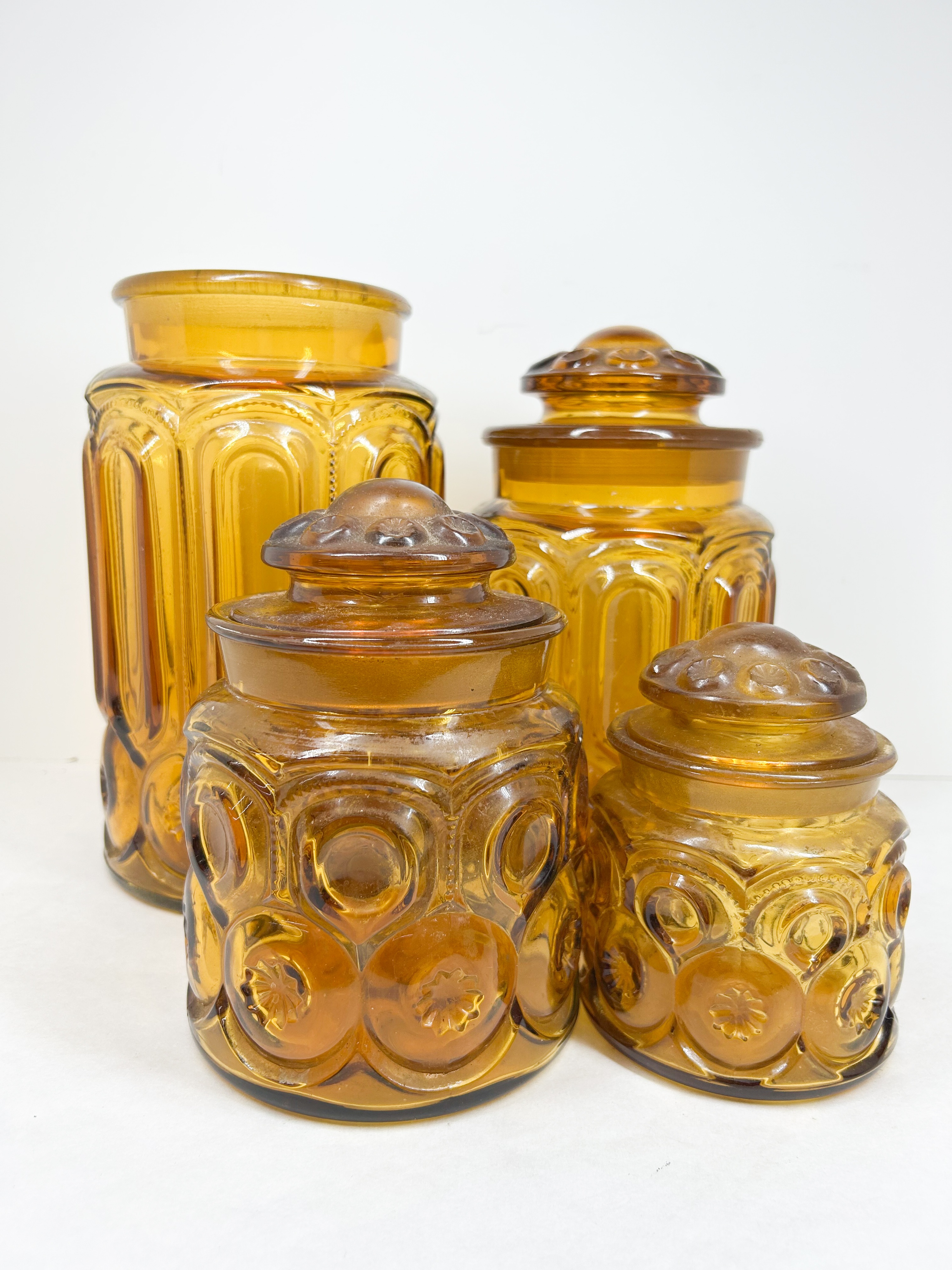 AMBER MOON AND STAR GLASS CANISTERS